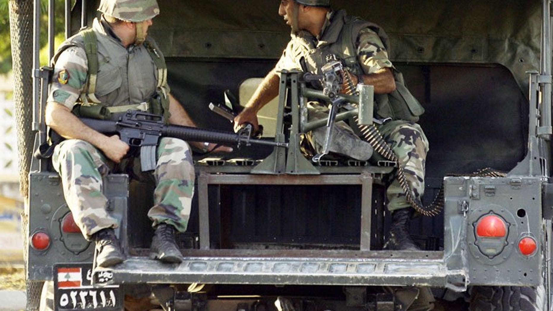 Lebanese soldiers deploy in Sidon's Abra suburb on Tuesday after a shooting spree by Salafist gunmen. The shooting by gunmen loyal to a controversial sheikh left one man dead and several wounded, the army and a security source said.