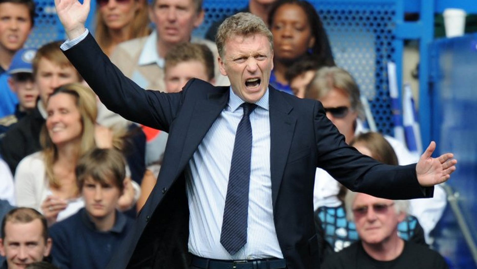 David Moyes watches former club Everton play Chelsea at Stamford Bridge on May 19. Champions Manchester United, Moyes's new club, will begin their title defence with a trip to League Cup winners Swansea, the English Premier League said on Wednesday as it announced the 2013/14 fixtures.