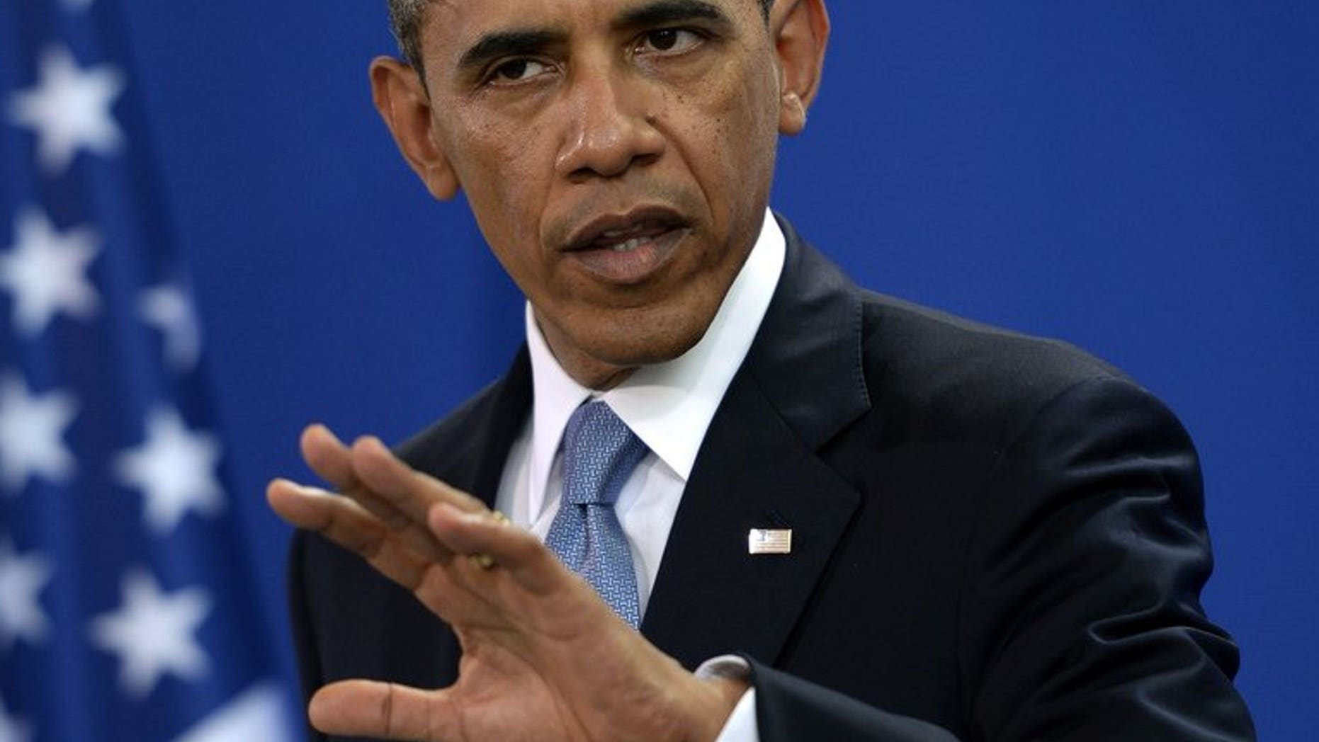 Barack Obama at a press conference in the Chancellery in Berlin on Wednesday. The US president refused to specify the exact nature of new US military aid to Syrian rebels, despite signals from top US officials that they will be get small arms and ammunition.