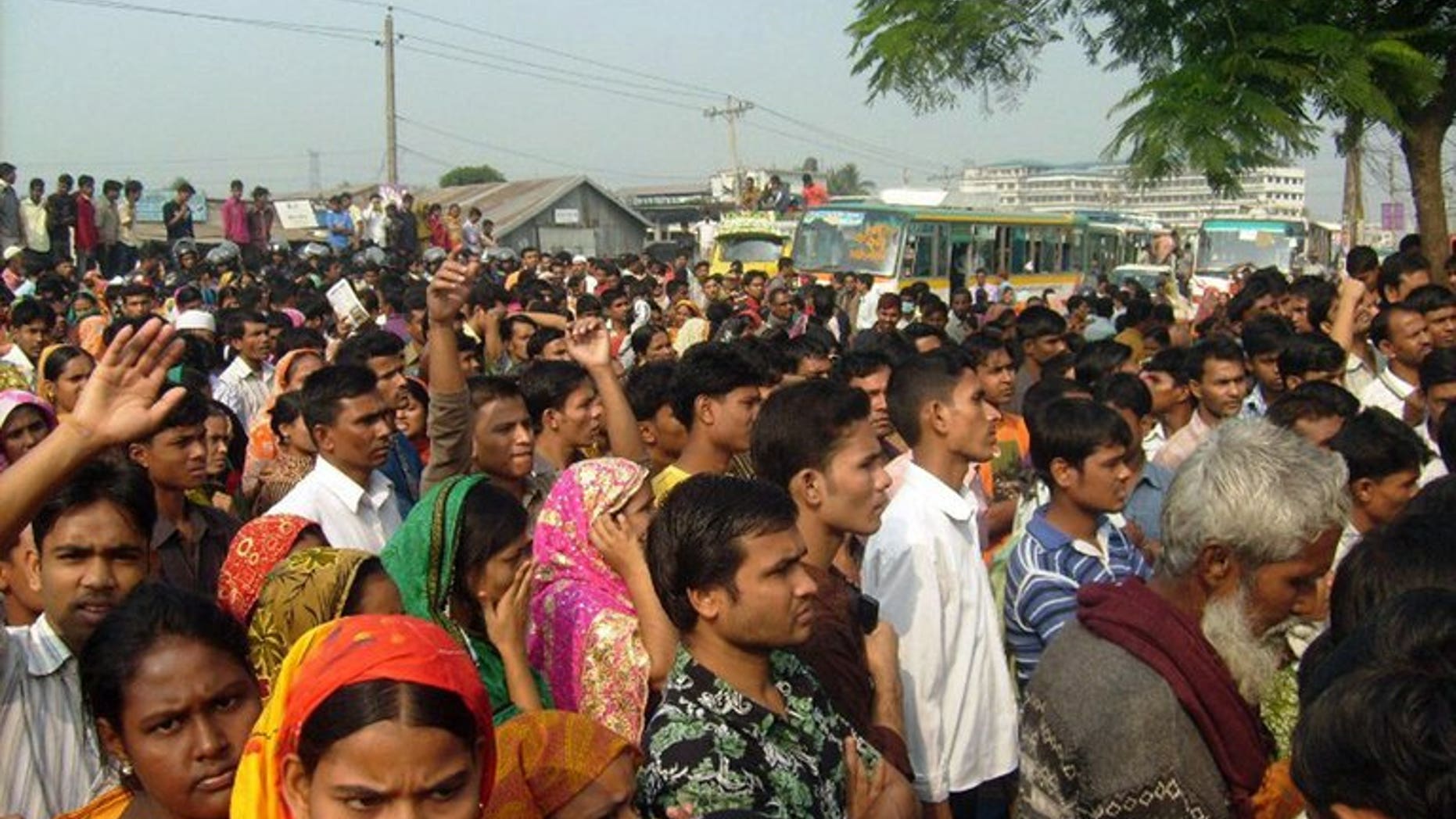 In a file picture taken on December 13, 2010 Bangladeshi garment workers block the road in Gazipur some 35 kms north of Dhaka. Owners of a Bangladesh garment factory were forced to offer prayers and distribute food to the poor on Wednesday in a bid to drive out what workers believed was a ghost at the plant, police said.