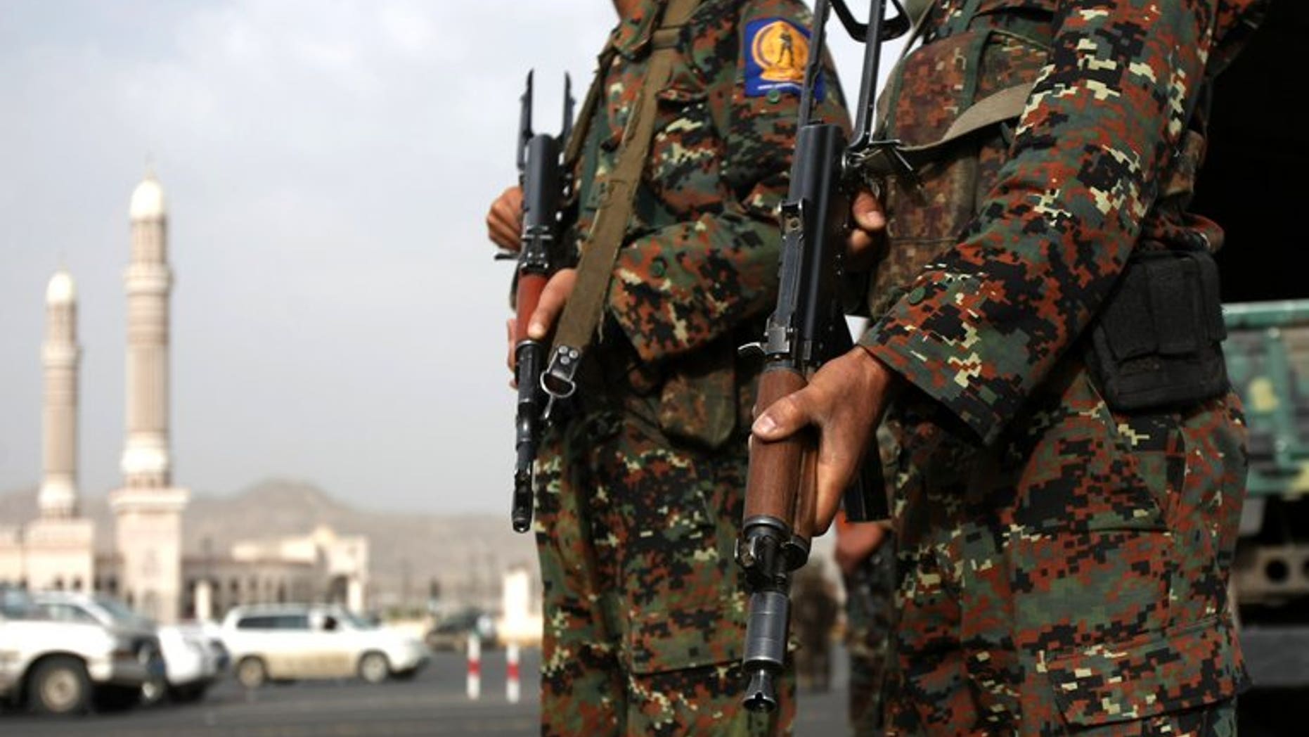 Yemeni soldiers stand guard on August 5, 2012, in Sanaa. Yemeni tribesmen have kidnapped 11 soldiers, including two officers, and are demanding the release of a relative convicted of murder, tribal sources said on Wednesday.