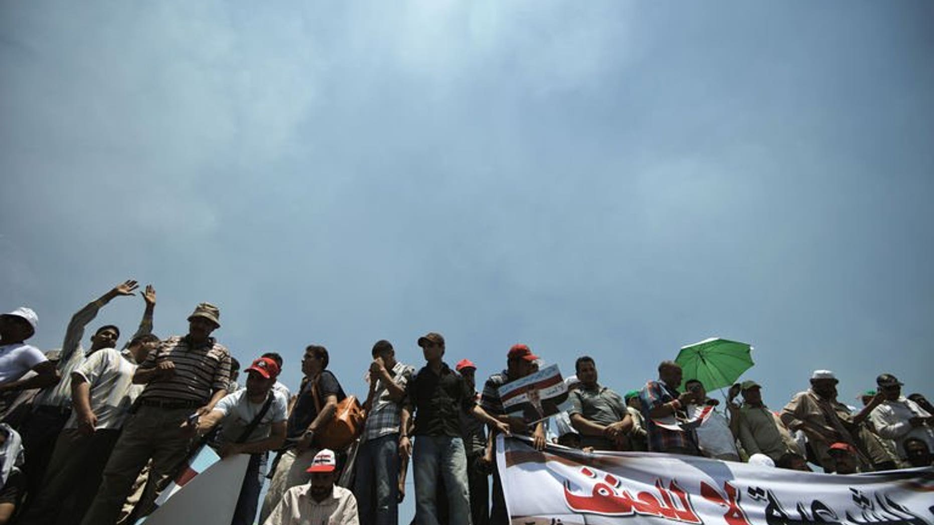 Egyptian Islamist groups led by the ruling Muslim Brotherhood take part in a demonstration to mark the upcoming one year anniversary since President Mohamed Morsi was elected, on June 21, 2013 in Cairo. Egypt's airports will raise their alert level to "high" ahead of June 30 when anti-Morsi protests are planned.