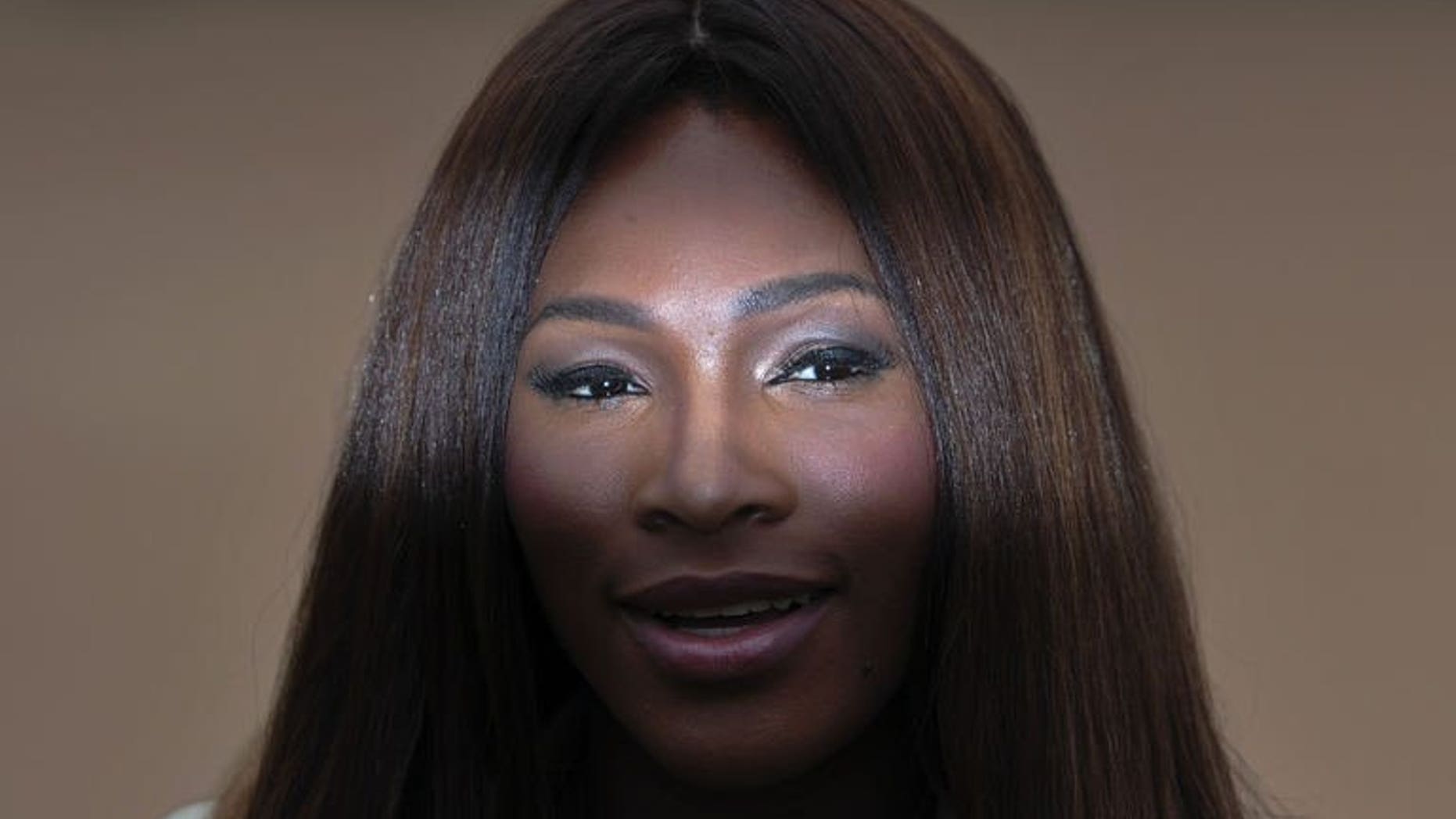 US tennis player Serena Williams poses for photographers as she arrives to attend the Burberry men's fashion show in London on June 18, 2013. Maria Sharapova has blasted Williams for the American's controversial comments over a high-profile rape case and even criticised the Wimbledon champion's private life.