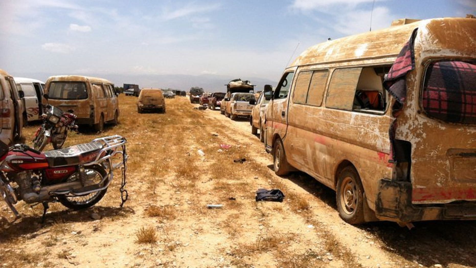 Cars left behind by rebels in Dabaa, north of Qusayr, in Syria's central Homs province on June 7, 2013. The CIA and US special operations forces have been training Syrian rebels for months, since long before President Barack Obama announced plans to arm the opposition, the Los Angeles Times reported Friday.
