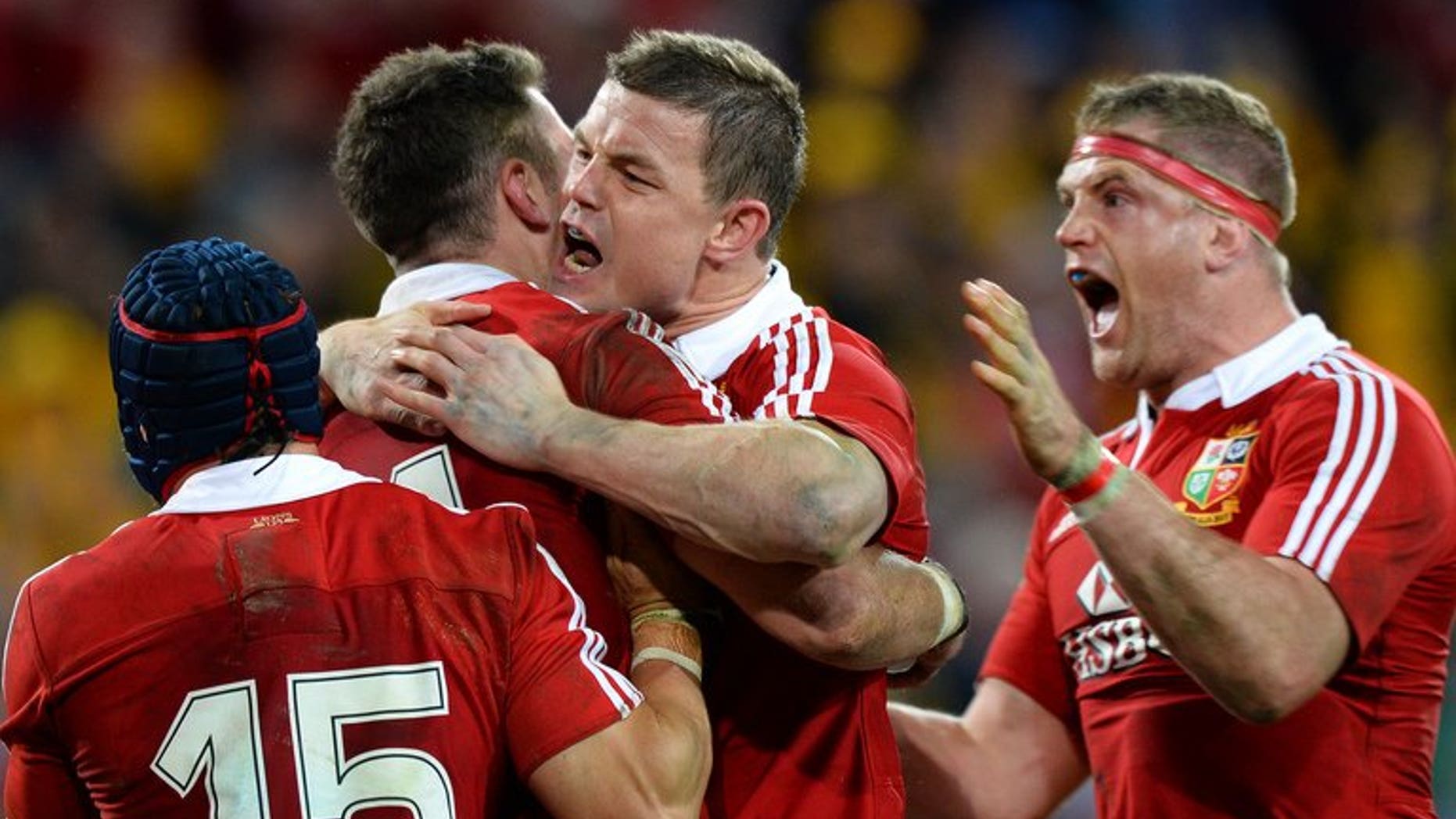The British and Irish Lions celebrate Alex Cuthbert's try against Australia on June 22, 2013. The thrilling 23-21 first Test win over Australia was "larceny" and the rest of the series will be a similarly nerve-shredding affair, Britain's newspapers warned.