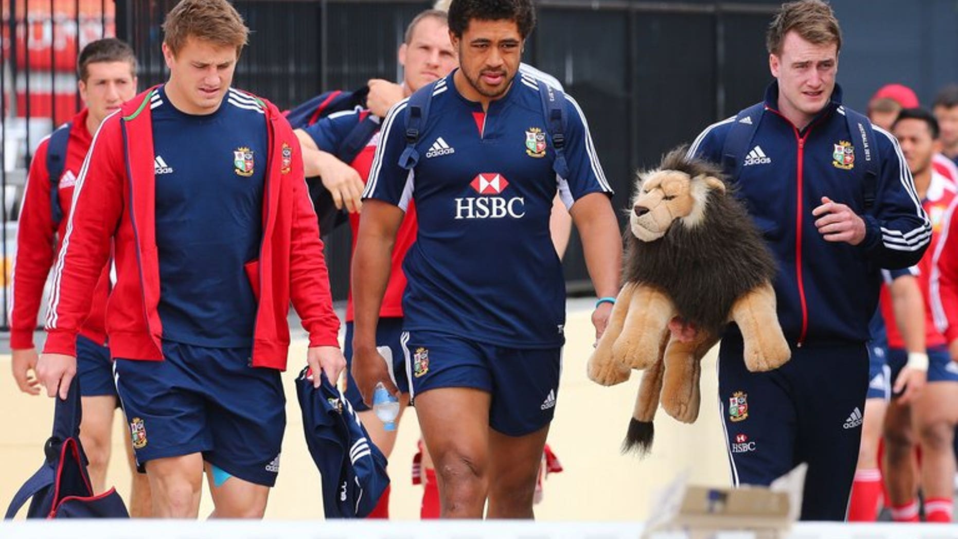 British and Irish Lions (L-R) Jonathan Davies, Manu Tuilagi and Stuart Hogg arrive for training in Brisbane on June 7, 2013. England centre Tuilagi will make his return from injury in the tour game against the Rebels in Melbourne on Tuesday.