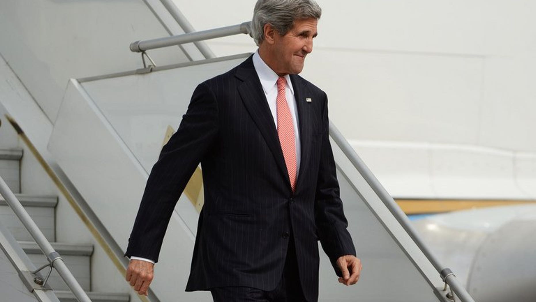 US Secretary of State John Kerry arrives at Palam Air Force Station in New Delhi, on June 23, 2013. Kerry has arrived on his first official visit to India, an AFP reporter said, as the US administration was rocked by news that a wanted former American intelligence operative had flown out of Hong Kong.