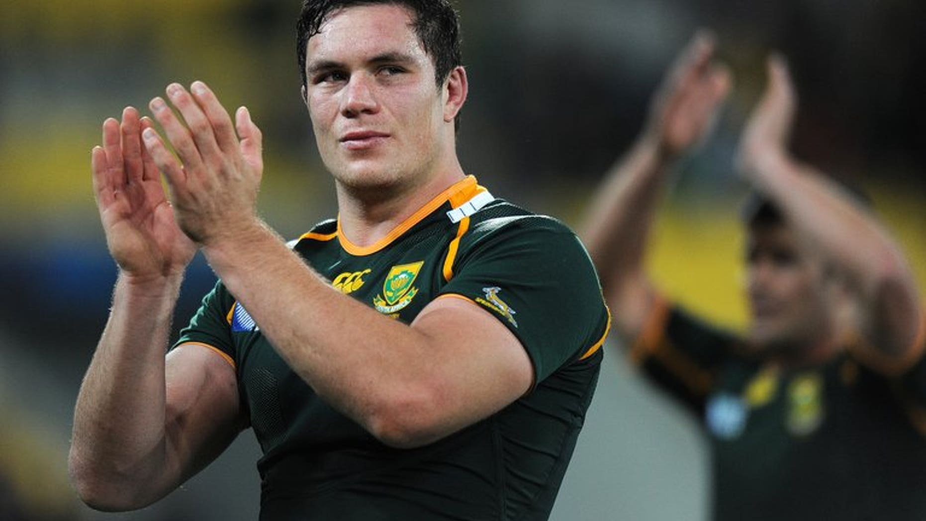 South Africa's Springbok Francois Louw applauds after a 2011 Rugby World Cup match against Australia in Wellington on October 9, 2011. South Africa coach Heyneke Meyer has hailed loose forwards Louw and Willem Alberts after a 56-23 triumph over Samoa this weekend in a four-nation tournament final.