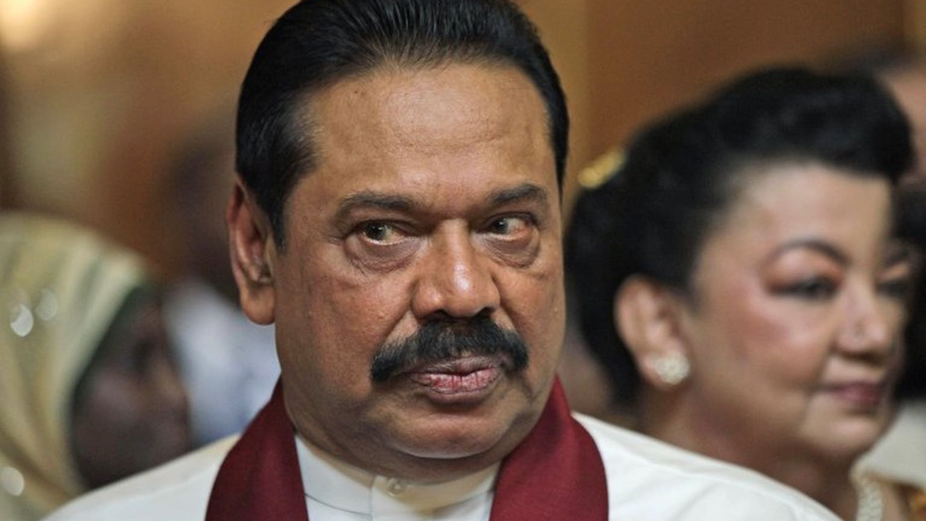 Sri Lankan President Mahinda Rajapaksa attends a reception in London, on June 6, 2012. Rajapakse has scrapped a contentious code of conduct for journalists after editors and rights groups condemned it as a further blow to press freedom, government and media sources told AFP.