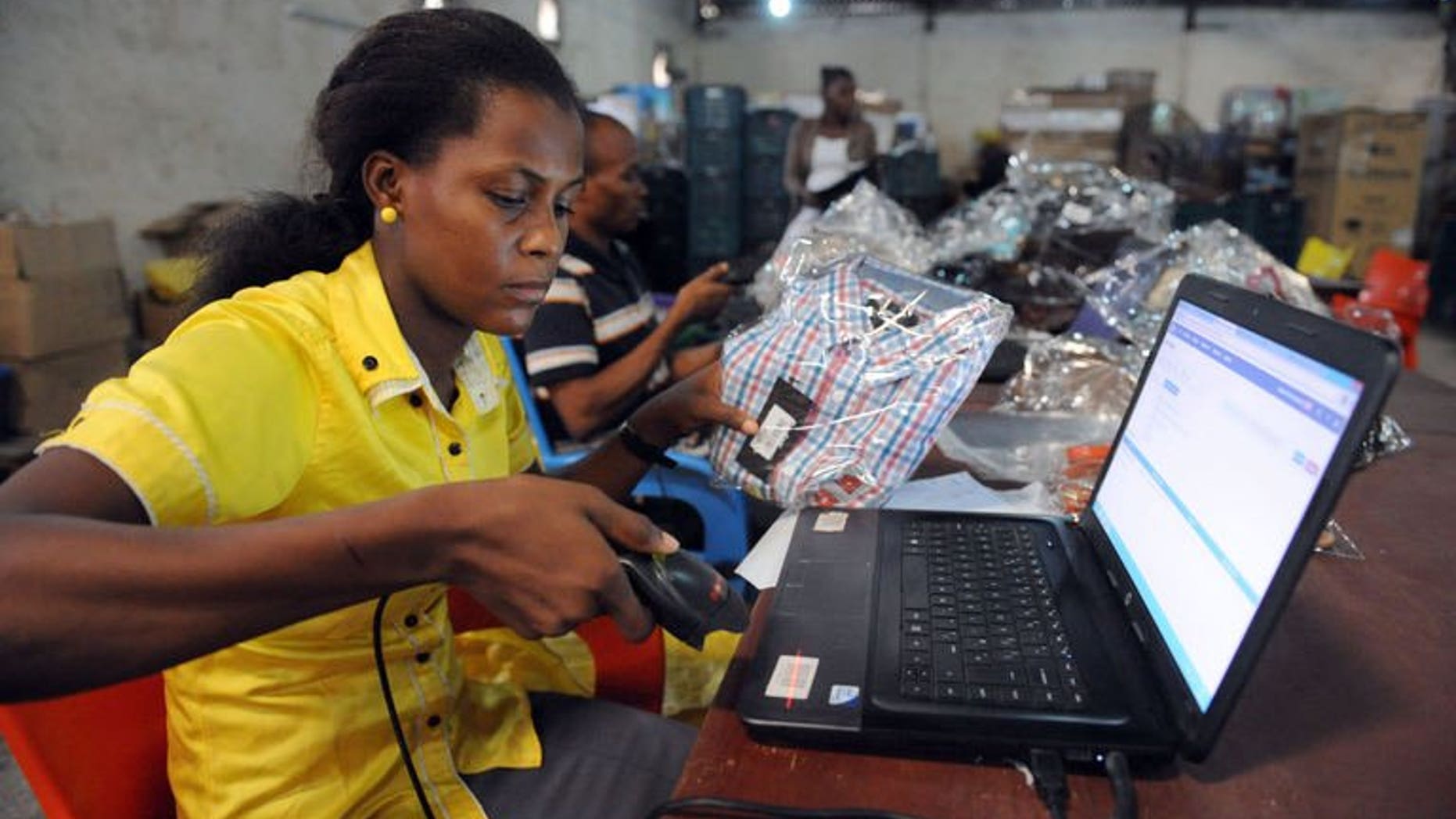 A worker at Internet company Jumia scans a product in Lagos, Nigeria on June 12, 2013. Nigeria, Africa's biggest market of 160 million people, has seen Internet access expand rapidly in recent years, opening opportunities for companies to exploit.