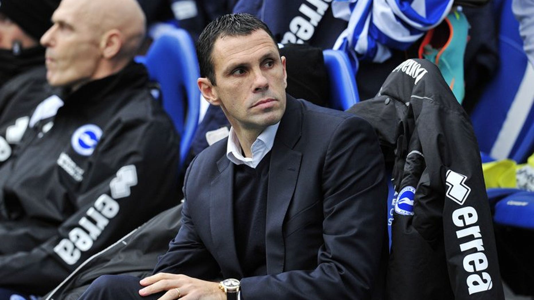 Brighton and Hove Albion's Uruguayan manager Gus Poyet looks on during the FA Cup third round at The American Express Community Stadium, Brighton, southern England on January 5, 2013. Brighton and Hove Albion sacked Poyet on Sunday night - and the Uruguayan only learned the news on live television.