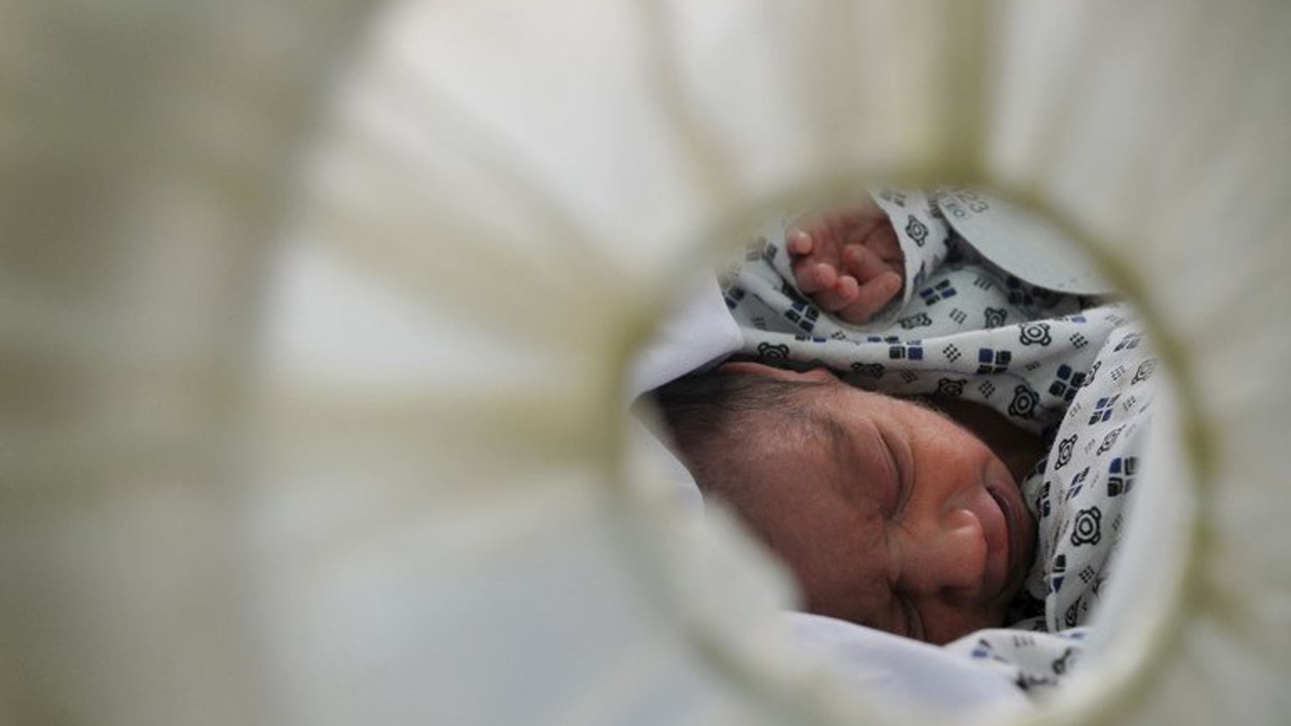 A newborn baby at a hospital in Kabul on October 17, 2011. A former executive at the centre of allegations of a cover-up of preventable deaths of babies and mothers at a Cumbria hospital on Monday denied involvement in ordering a critical report to be deleted.