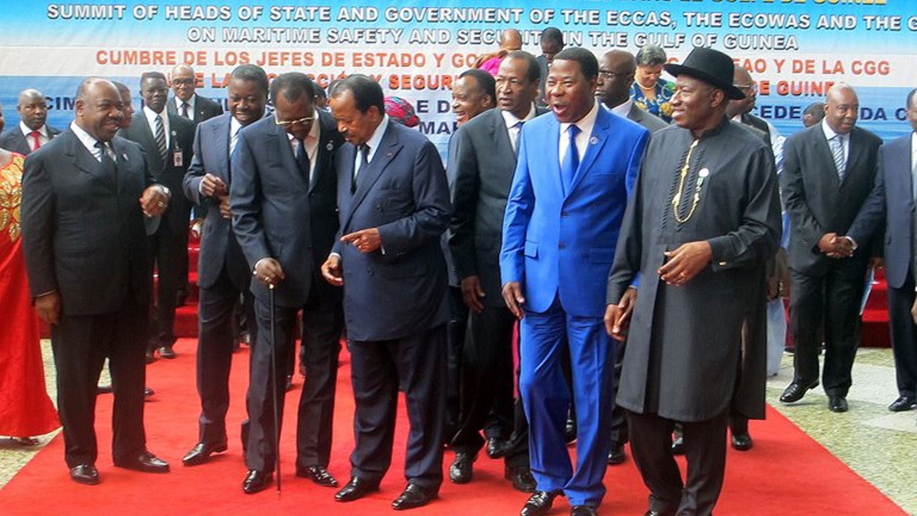 (From L) The presidents of Gabon Ali Bongo Ondimba , Togo Faure Gnassingbe, Chad Idriss Deby Itno, Cameroon Paul Biya, Congo Denis Sassou Nguesso, Burkina Faso Blaise Compaore, Benin Thomas Yayi Boni and Nigeria Goodluck Jonathan prepare for a group picture in Yaounde at a meeting of West and Central African leaders on maritime security in the Gulf of Guinea, on June 24, 2013.