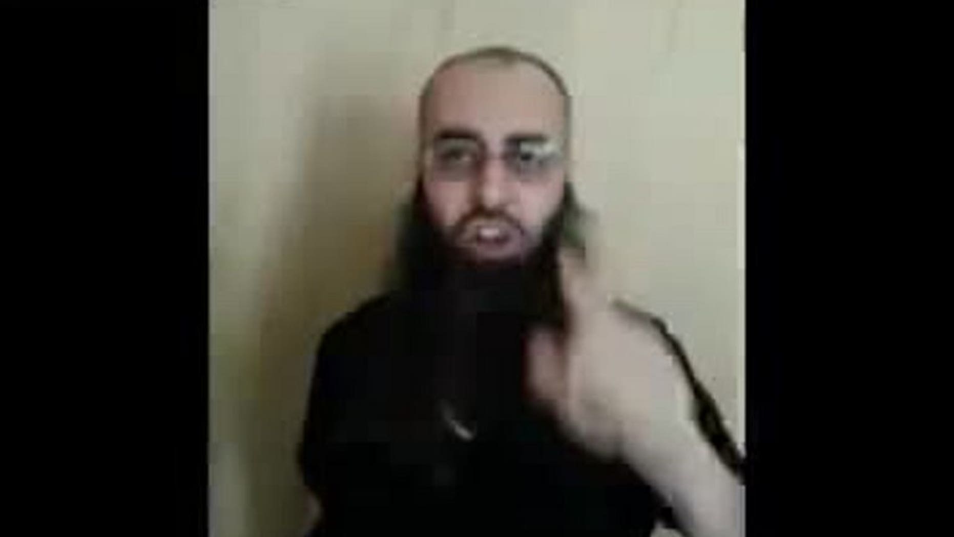 An image grab taken from a video uploaded on LiveLeak on June 23, 2013 shows Sunni Muslim Salafi cleric Sheikh Ahmad al-Assir. Assir, whose supporters are engaged in a deadly stand-off with the army, gained prominence for his anti-Hezbollah rhetoric but began by proselytising in a mosque in the south.