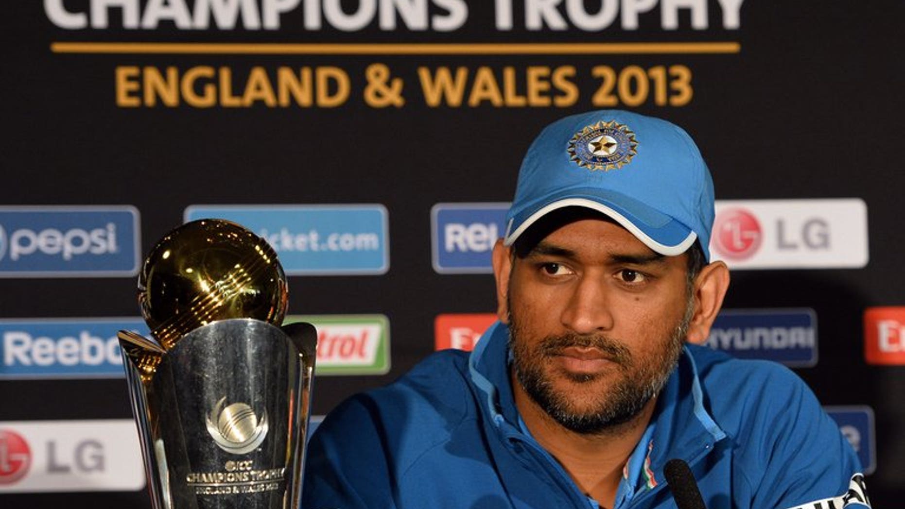 Indian captain Mahendra Sing Dhoni listens to questions during a press conference at Edgbaston in Birmingham, England on June 22, 2013. Winners India provided five players in the Champions Trophy team of the tournament announced by the International Cricket Council (ICC) on Monday.
