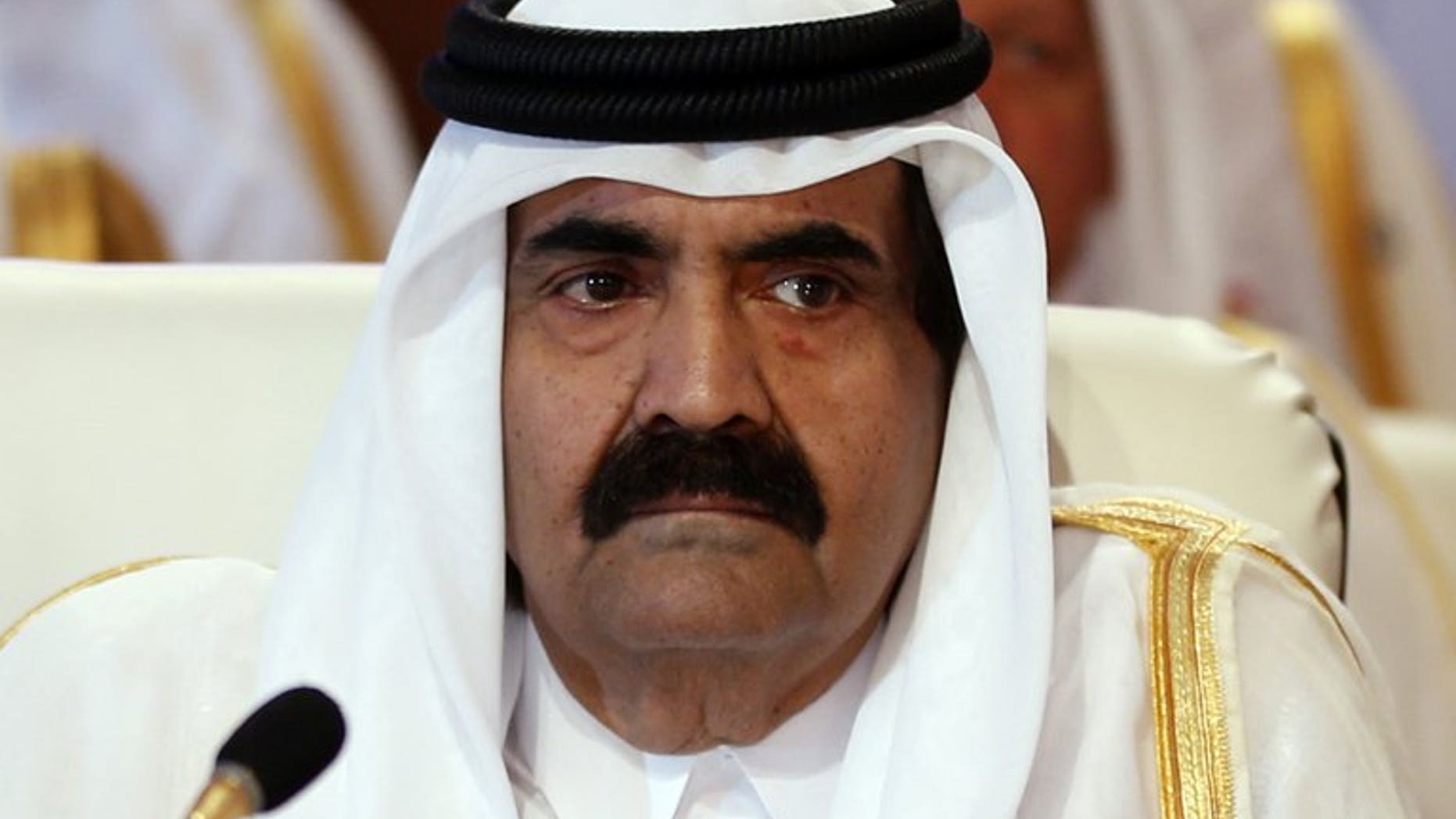 Qatar's Emir Hamad bin Khalifa al-Thani in Doha on March 26, 2013. Sheikh Hamad, who is to hand over to his son on Tuesday after 18 years on the throne, turned the tiny Gulf state from a desert backwater into a major world player.