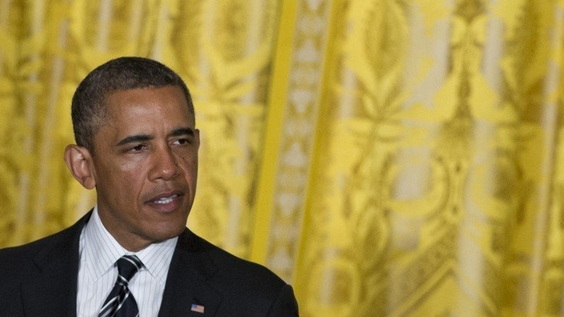 US President Barack Obama speaks during a LGBT Pride Month celebration in the East Room of the White House in Washington, DC, June 13, 2013. Obama is unlikely to see critically ill Nelson Mandela when he visits South Africa later this week, the country's minister of international relations said Tuesday.