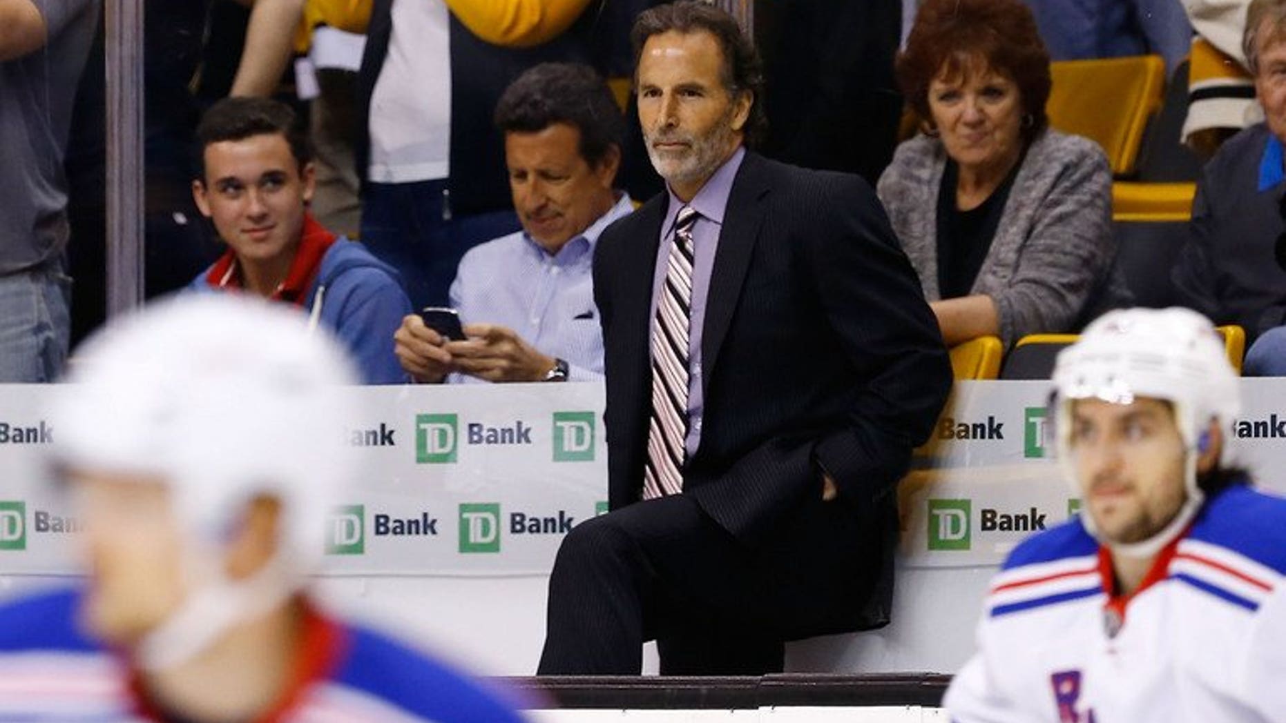 John Tortorella is seen during the 2013 NHL Stanley Cup Playoffs on May 19, 2013 at TD Garden in Boston, Massachusetts. Tortorella was named coach of the National Hockey League's Vancouver Canucks on Tuesday, completing what turned out to be a swap of coaches with the New York Rangers.