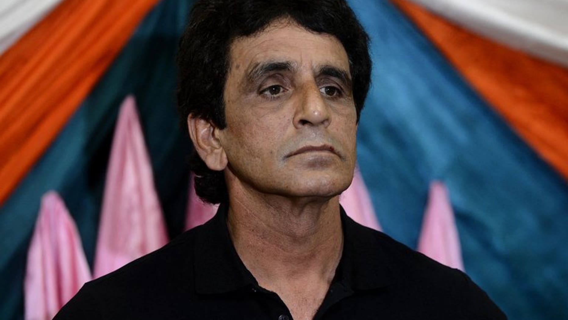 Pakistani umpire Asad Rauf speaks during a press conference in Lahore on May 29, 2013. Rauf and Billy Bowden have both been dropped from the International Cricket Council's panel of elite umpires, the global governing body announced Tuesday.
