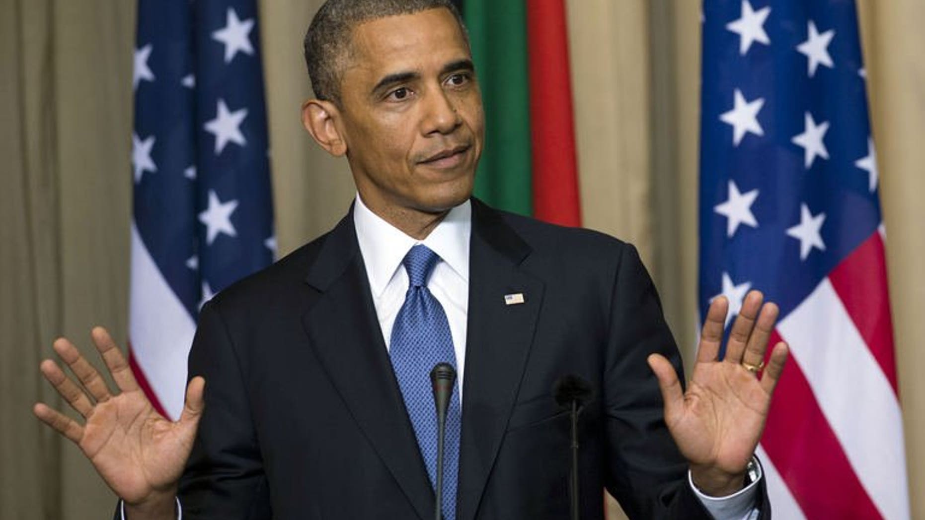 US President Barack Obama addresses a news conference in Pretoria, South Africa, on June 29, 2013. Obama has urged Africans to ask more questions about lop-sided deals with some foreign investors, while dismissing talk of a Chinese and US scramble for influence on the continent.