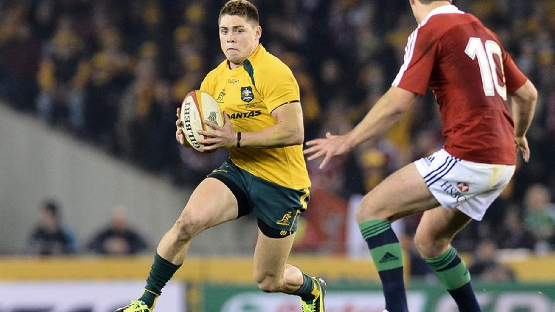 James O'Connor of Australia runs with the ball during the second Test against the British and Irish Lions on June 29, 2013. Australia won the match 16-15.