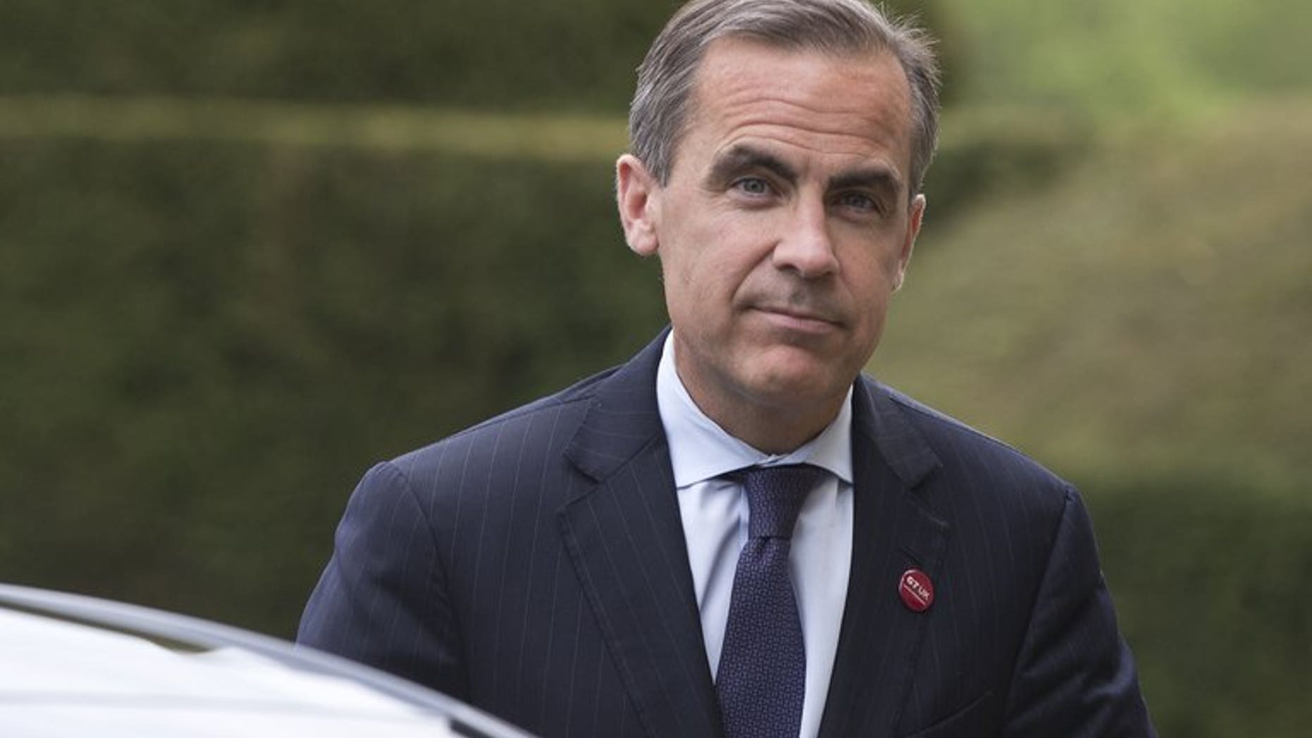 Canadian Mark Carney, pictured in May, 2013, begins his job as governor of the Bank of England on Monday, joining an institution divided on whether to pump out more cash stimulus to boost Britain's fragile economic recovery