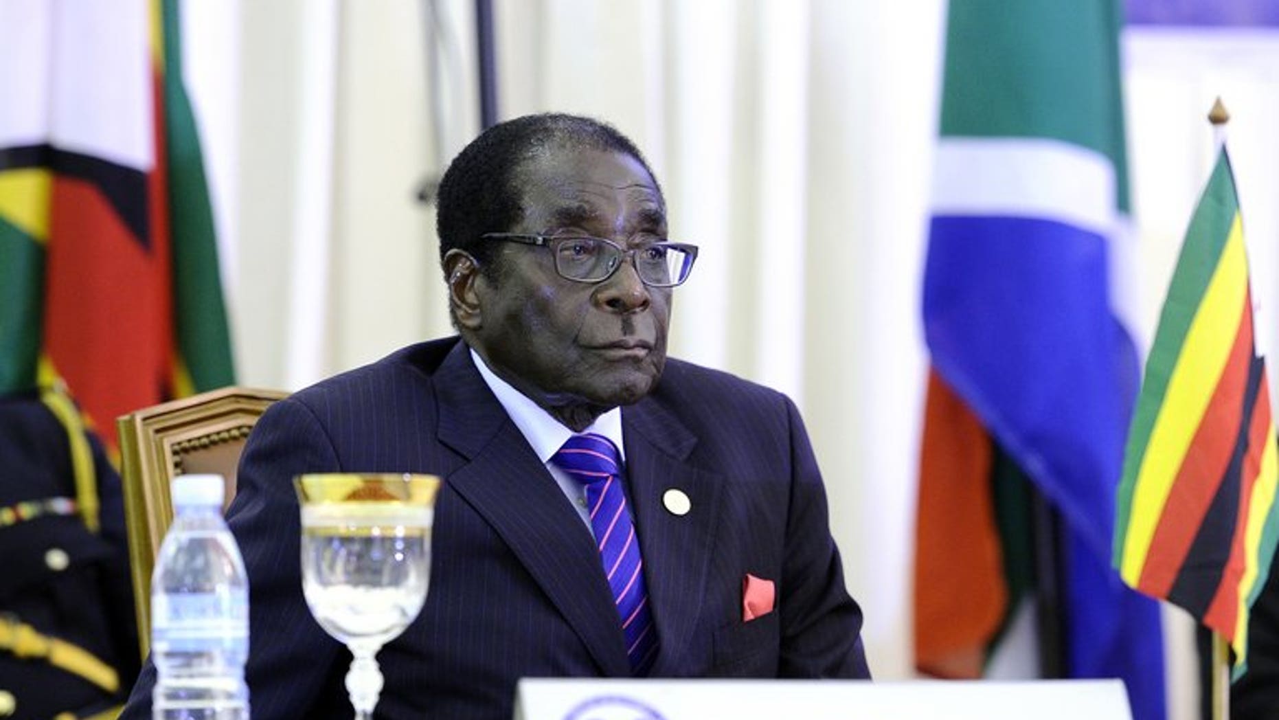 Zimbabwean President Robert Mugabe attends the opening ceremony of the 31st SADC summit on August 17, 2011 in Luanda, Angola. Mugabe has become Zimbabwe's sole law-making authority until the next elections are held following the automatic dissolution of parliament, his justice minister told state media.