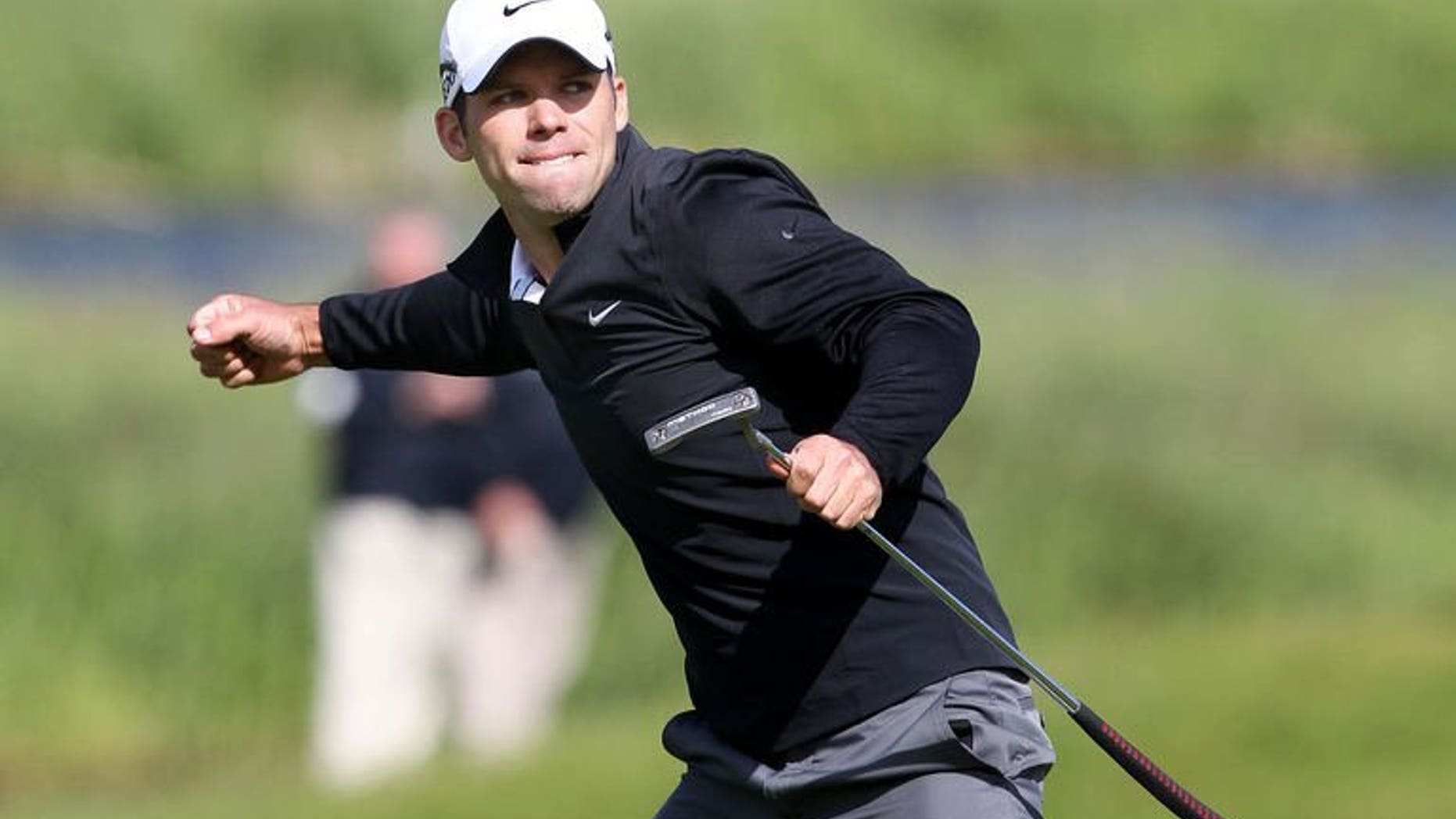 England's Paul Casey celebrates after putting for an eagle on the 18th green during the final round of the Irish Open at Carton House Golf Club, Maynooth, Ireland on June 30, 2013. Casey sensationally eagled the last hole to end a two-year victory drought and capture the Irish Open at Carton House, Maynooth, on Sunday.