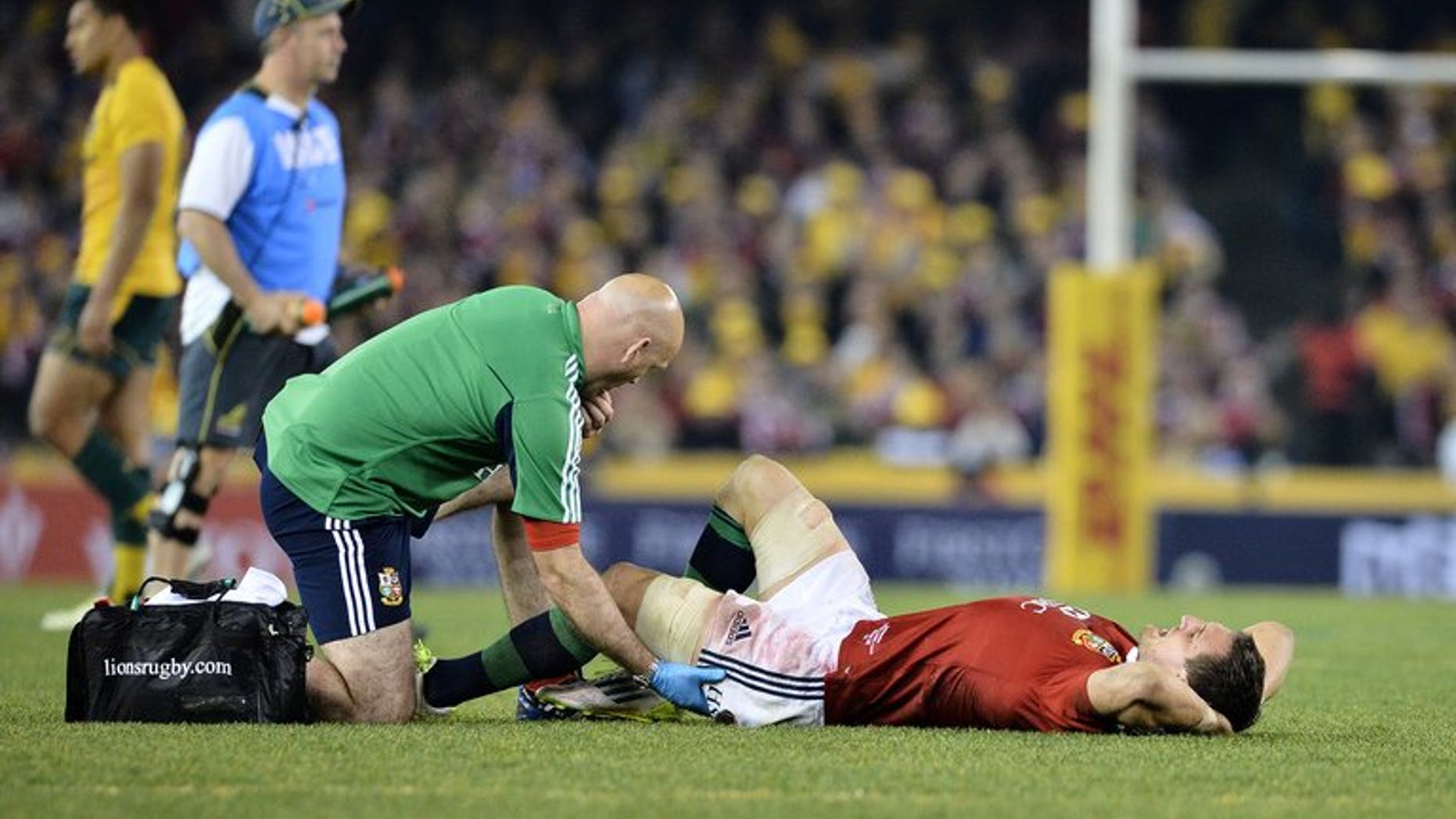 Lions captain Sam Warburton lies injured during the second Test against Australia on June 29, 2013. Warburton has been ruled out of Saturday's deciding Test in a massive blow for the tourists.