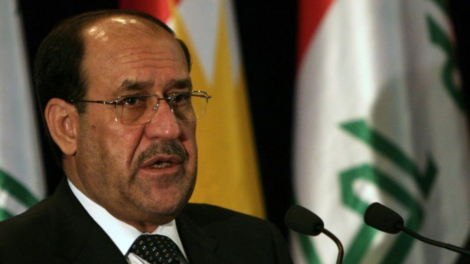Iraqi Prime Minister Nuri al-Maliki speaks during a joint press conference in Arbil, on June 9, 2013. Maliki has held talks in Moscow with the Russian oil company Lukoil about enacting an existing energy contract and possible participation in future deals, Lukoil said.