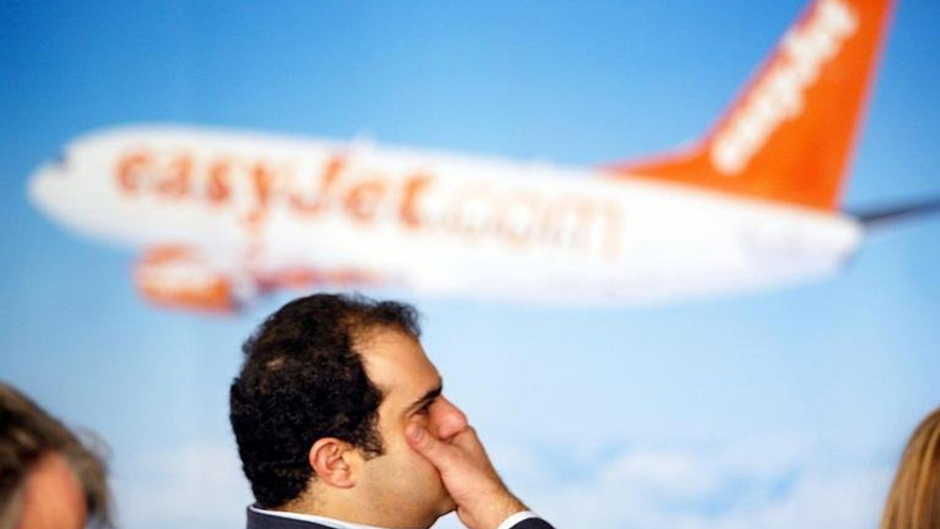 Stelios Haji-Ioannou pictured during a press conference announcing his resignation as chairman of EasyJet in London on November 26, 2002. Haji-Ioannou, the founder and biggest shareholder of the British no-frills airline , said on Monday that he would vote against the board's recent agreement to buy 135 Airbus single-aisle A320 passenger planes.
