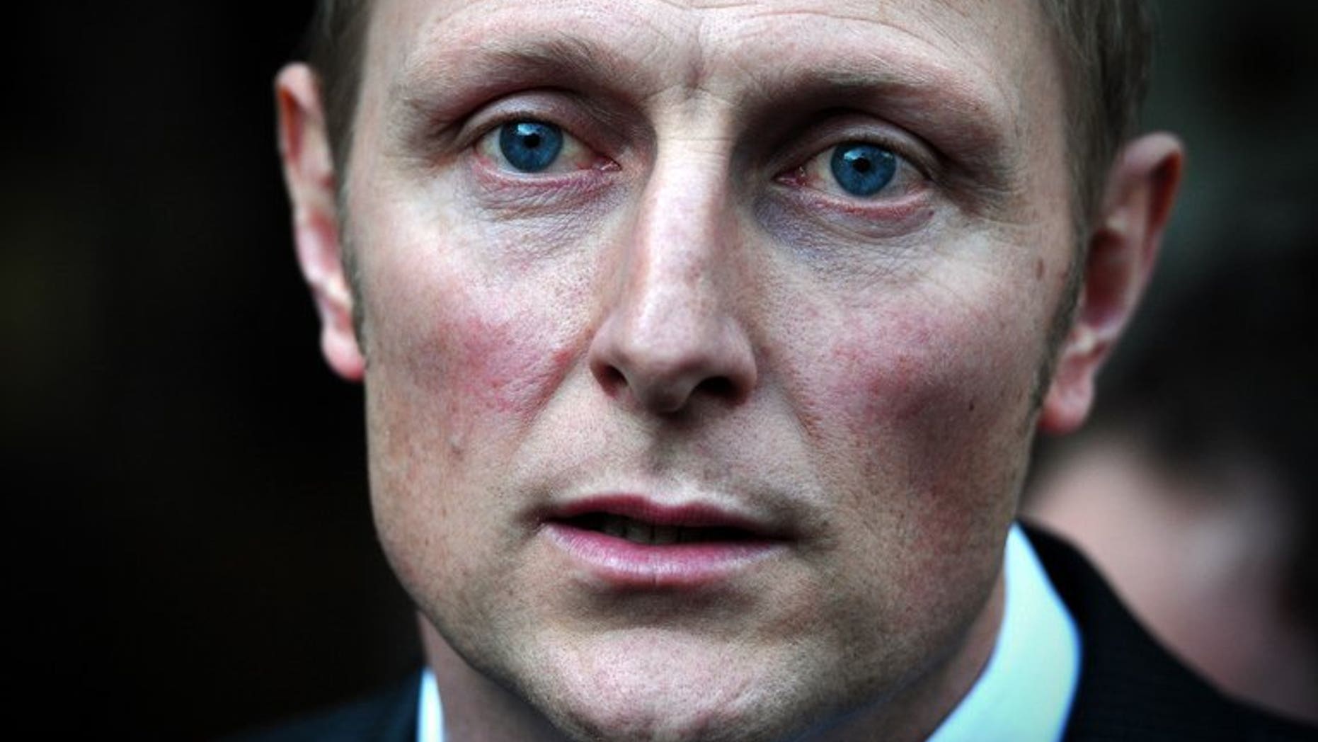 Former SAS sniper Danny Nightingale speaks to the media as he leaves the High Court in London on March 13, 2013. Nightingale will on Tuesday face the first day of evidence against him at a military court, where he is accused of illegally possessing a pistol and ammunition.