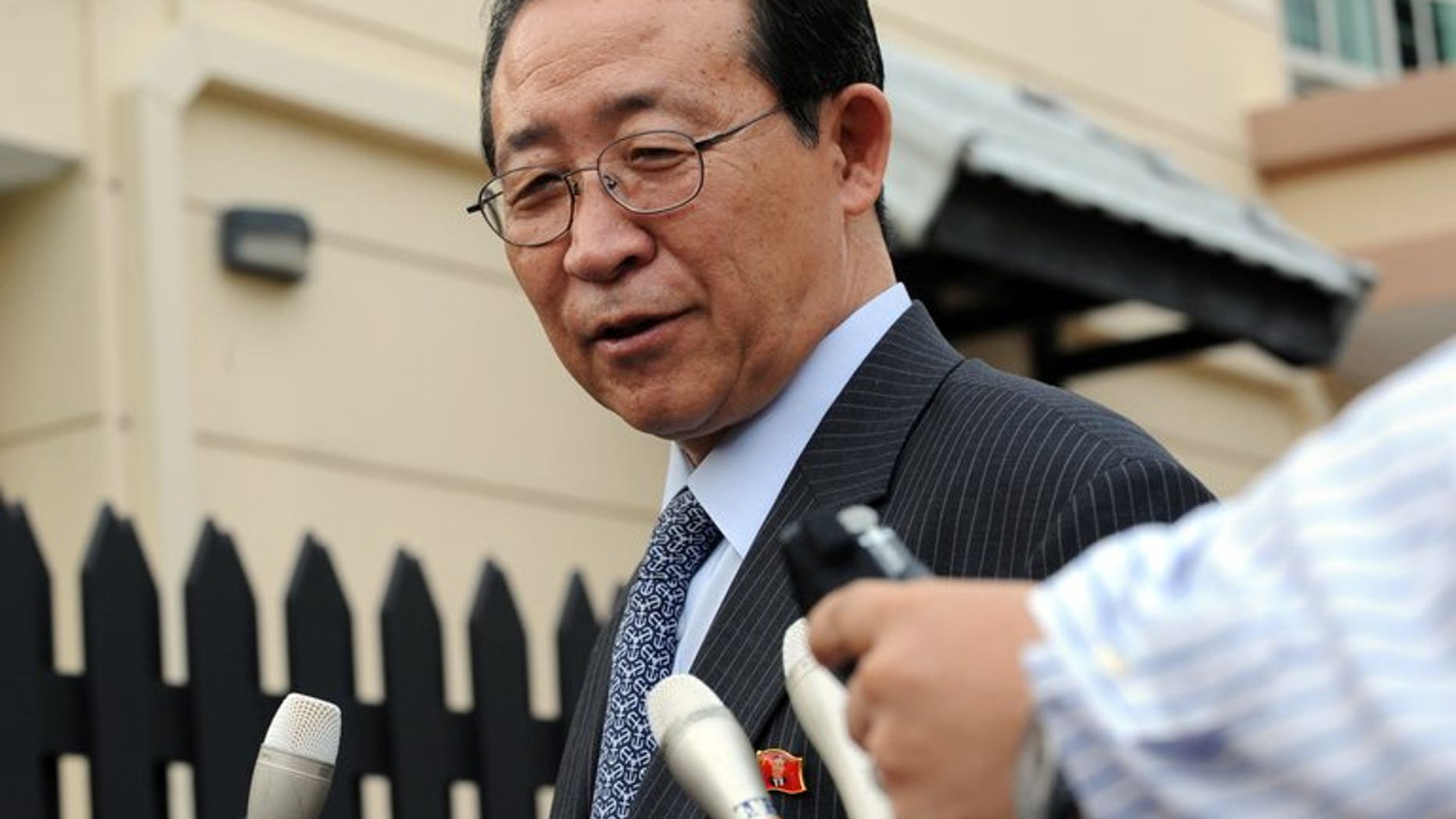 In this file photo, North Korean nuclear negotiator Kim Kye-Gwan talks to the reporters in Singapore, on December 5, 2008. Kim left on Tuesday for Russia, state media said, as the communist state steps up a diplomatic offensive after months of tension.