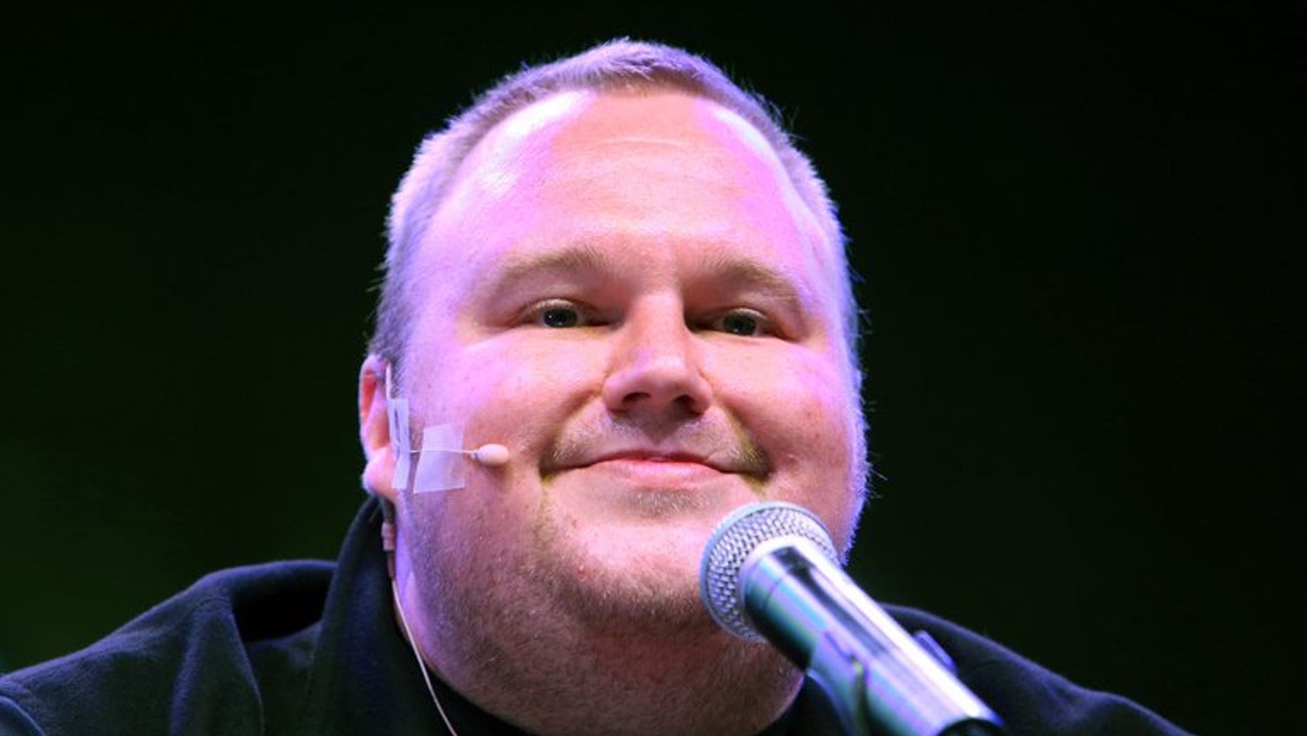 Megaupload founder Kim Dotcom during the launch of his new website on January 20, 2013. He and New Zealand Prime Minister John Key are set to come face to face for the first time Wednesday as lawmakers examine a controversial proposal allowing intelligence agencies to spy on local residents.