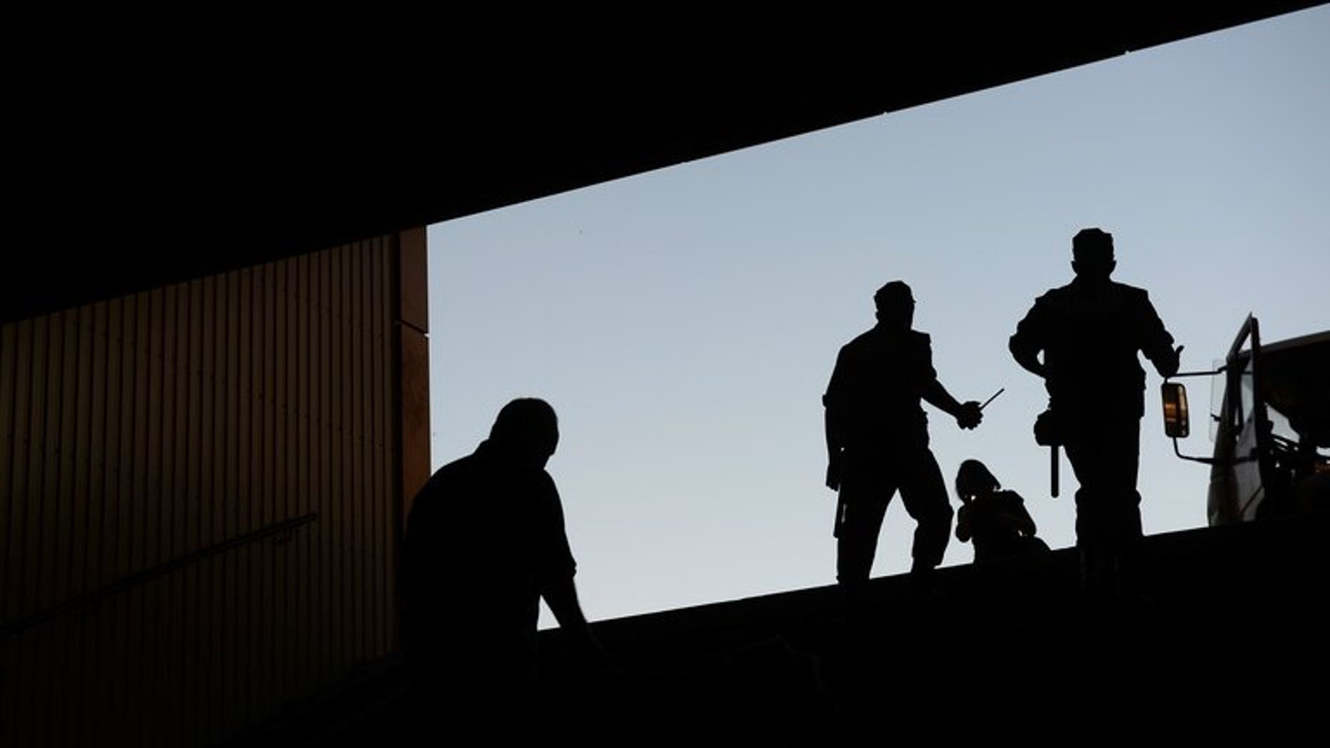 Police officers patrol in a Donetsk street on June 13, 2012. Hundreds of Ukrainians attempted Tuesday to storm a police building in a small southern village after two officers were accused of beating and raping a young woman, in a case that has reignited fury over police brutality in the former Soviet republic.
