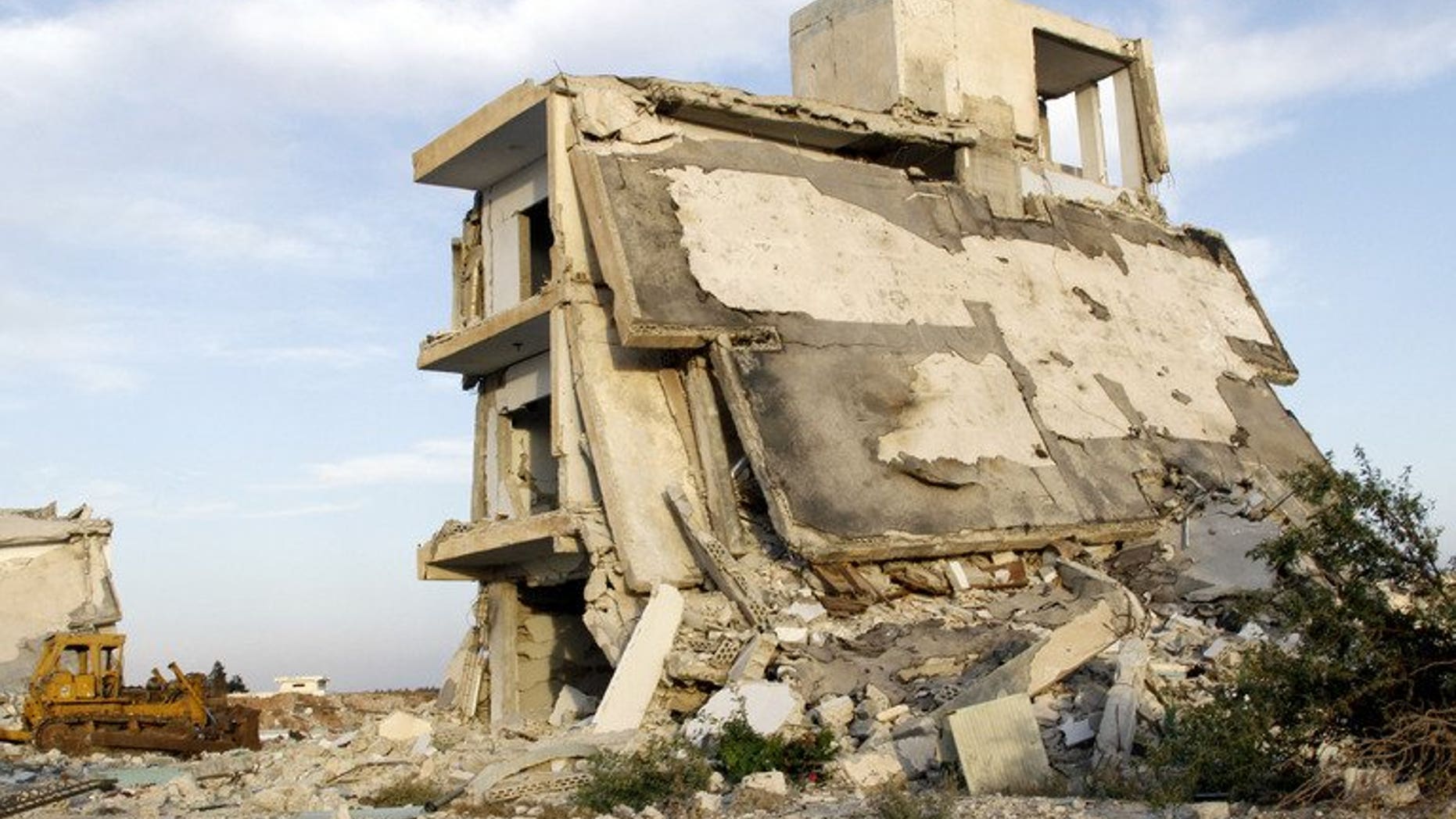 Destroyed buildings in the village of al-Hamidiyeh, in central Homs province, on June 7, 2013. UN leader Ban Ki-moon has expressed fear for 2,500 "trapped" civilians as Syrian government forces press a campaign to take the city of Homs, a spokesman said.