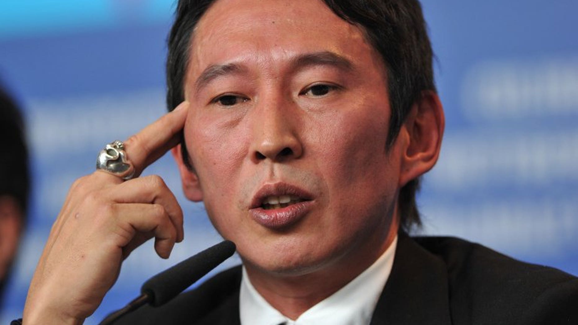 Taiwanese director Doze Niu gives a press conference on the film "Love" at the Berlin Film Festival on February 16, 2012. He faces prosecution for allegedly using false papers to take a Chinese cinematographer onto a Taiwanese naval base to scout film locations, the military said Thursday.