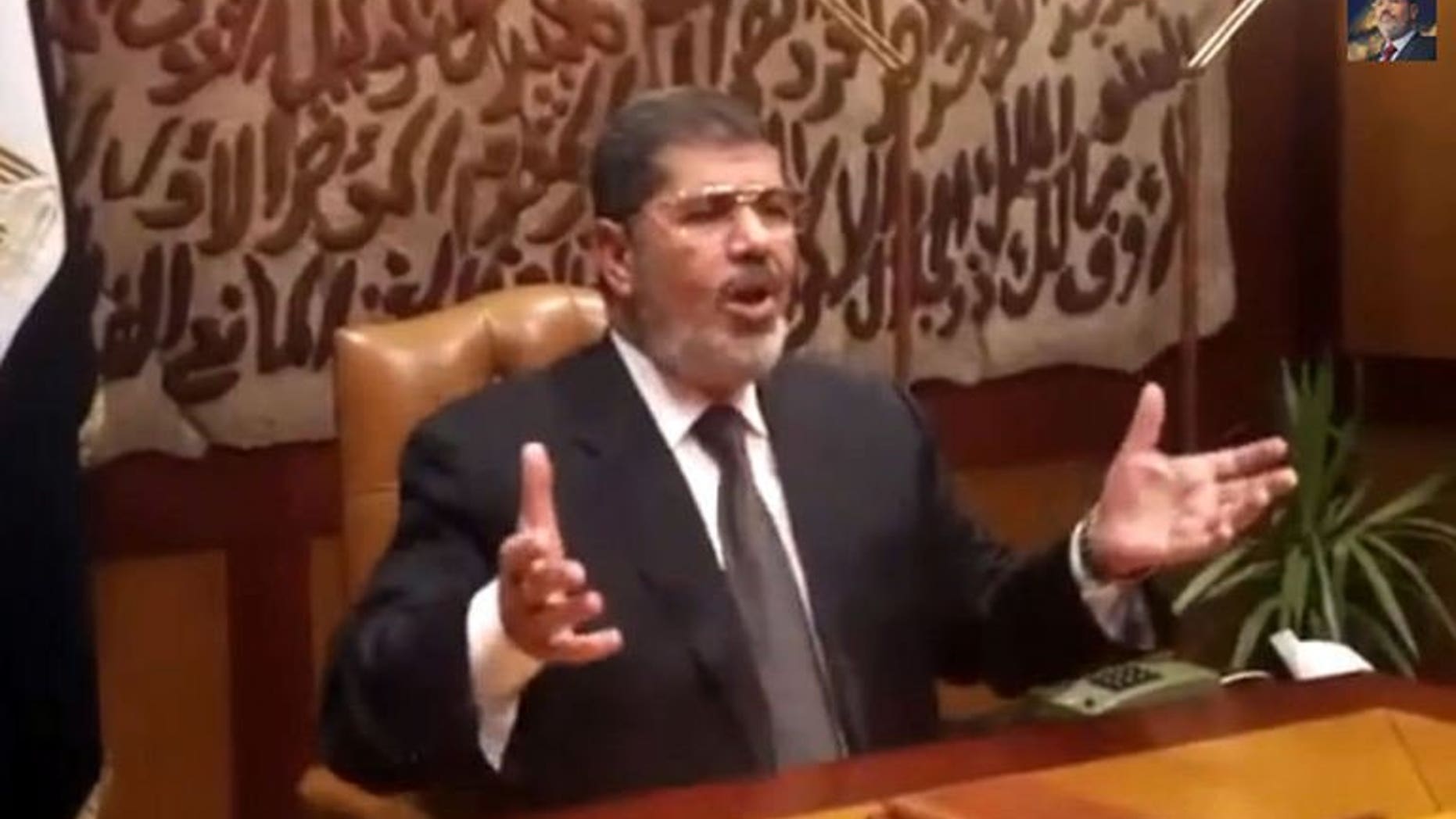 An image taken from a video released by the Muslim Brotherhood Office shows ousted president Mohamed Morsi speaking at an undisclosed location in Egypt, on July 3, 2013. Egypt's chief justice Adly Mansour has been sworn in as the country's interim president, a day after the military ousted and detained Morsi following a week of massive protests.