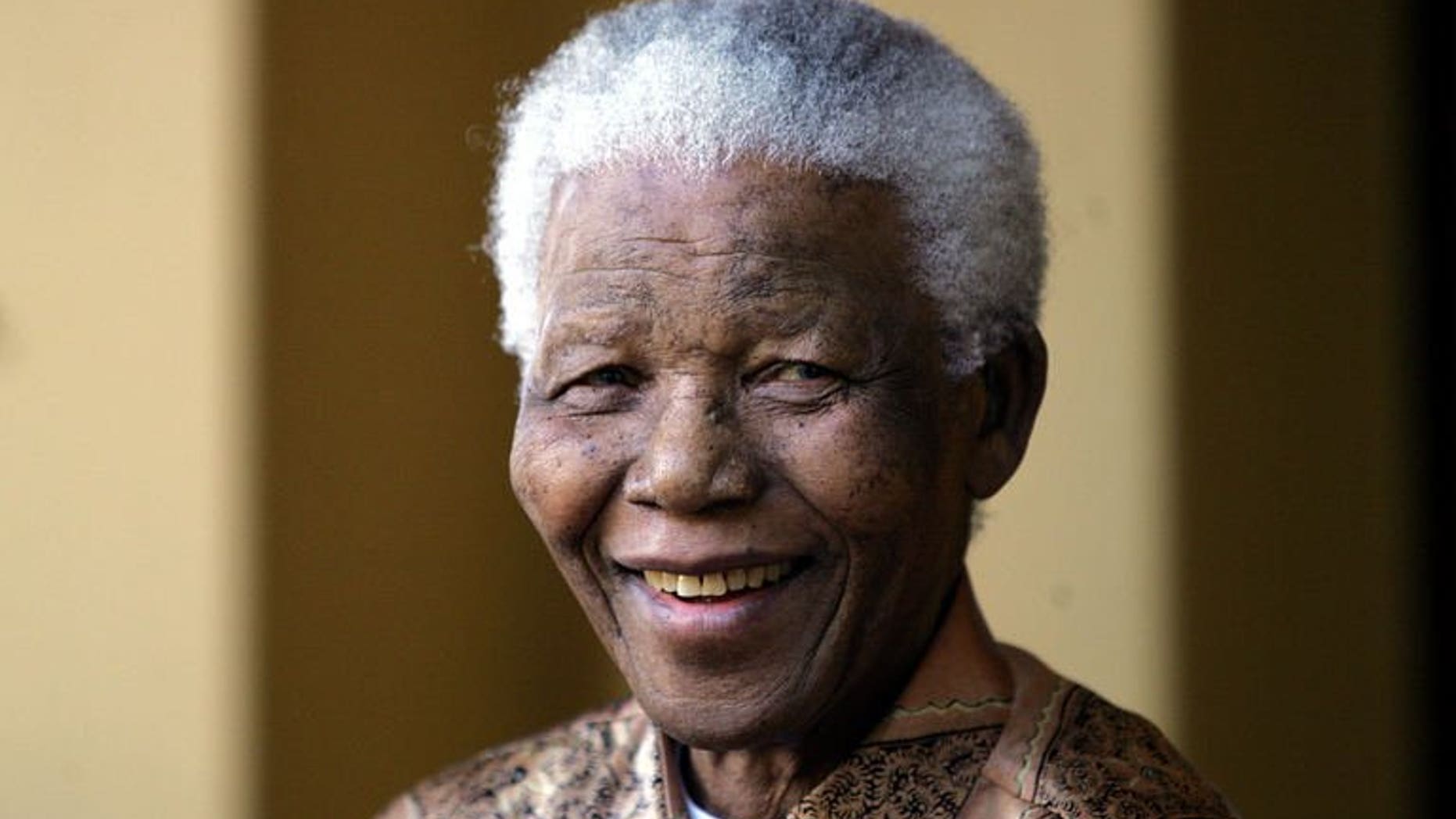 Former South African President Nelson Mandela gives a press conference in Johannesburg on June 14, 2005. Nearly 15 years ago Mandela was unperturbed by his own death, telling a dying teenager that he had lived his life to the full.