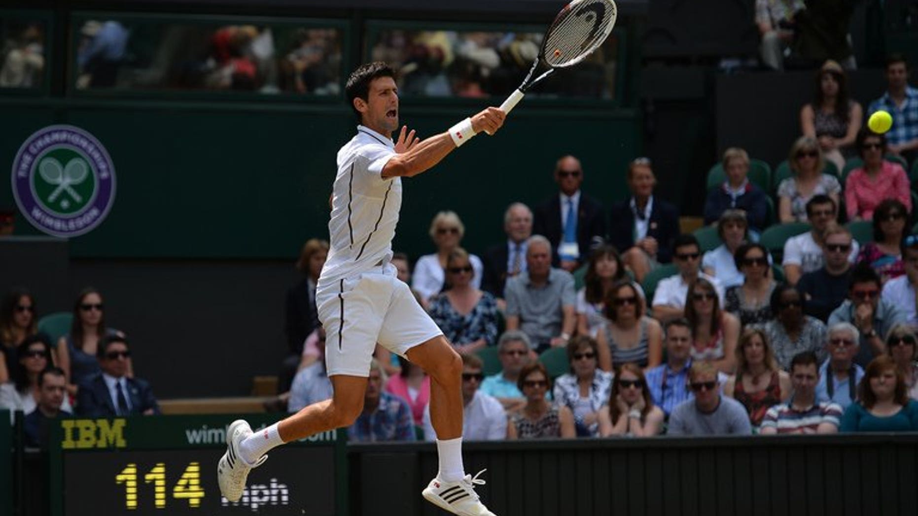 Novak Djokovic makes a return against Juan Martin Del Potro at Wimbledon on Friday. Novak Djokovic won the first set of his Wimbledon semi-final 7-5 against Juan Martin del Potro on Friday.