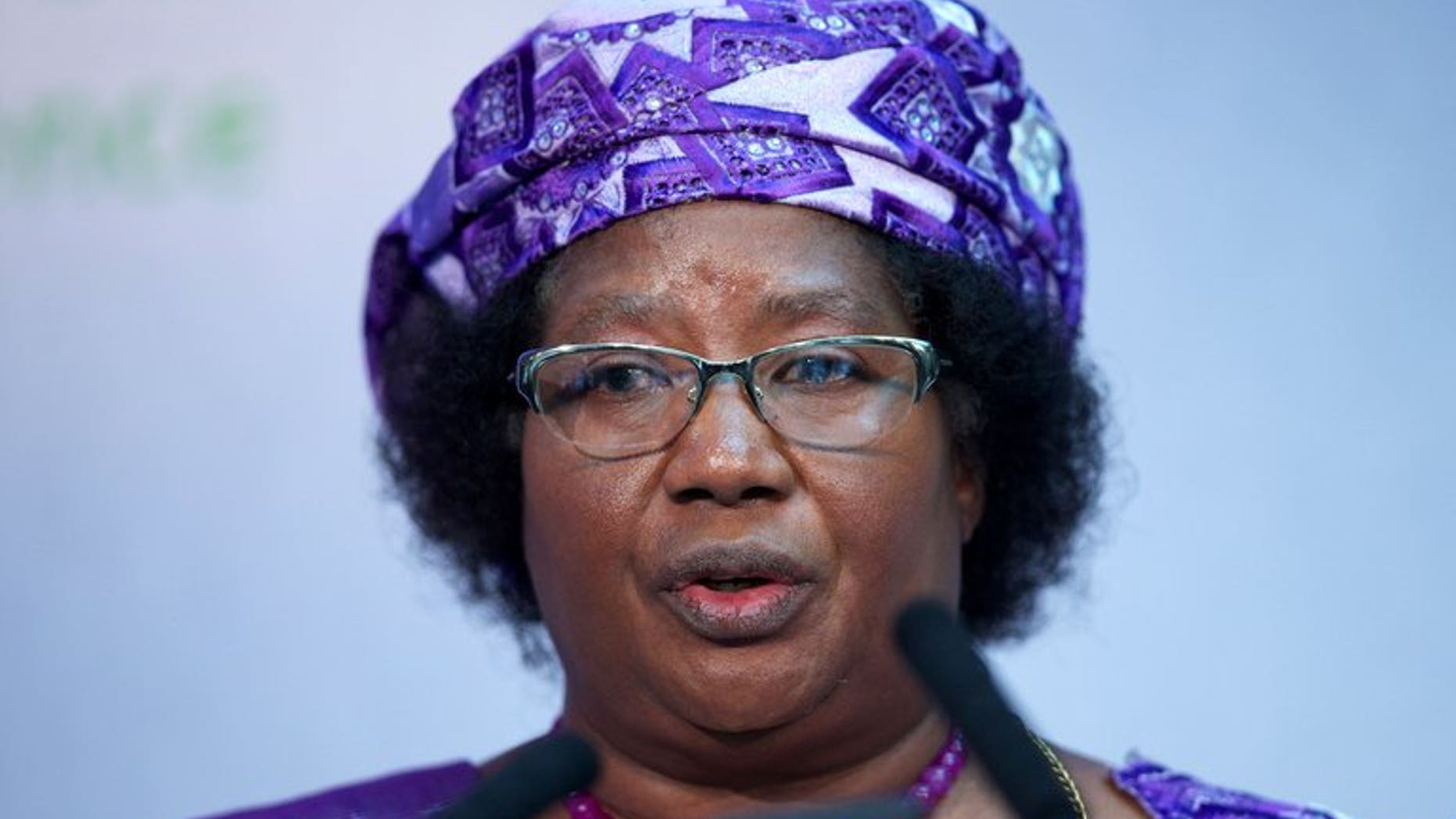 President of Malawi Joyce Banda, pictured in central London on June 8, 2013, gave a candid glimpse into the stresses of office, admitting that thinking of the plethora of problems including widespread poverty could drive her mad.