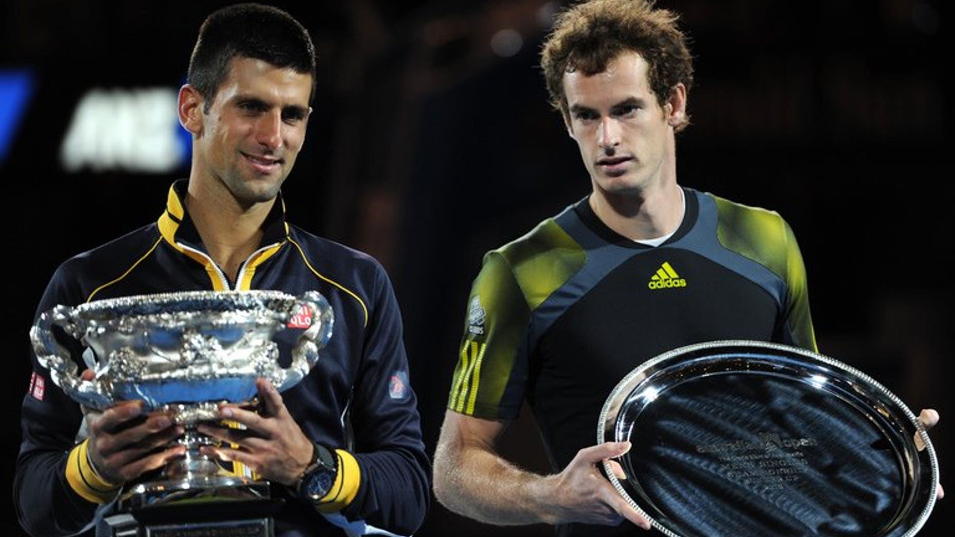 Noval Djokovic (left) and Andy Murray after the Australian Open final in Melbourne in January. Penpix of Novak Djokovic and Andy Murray who contest the Wimbledon men's final at the All England Club on Sunday.