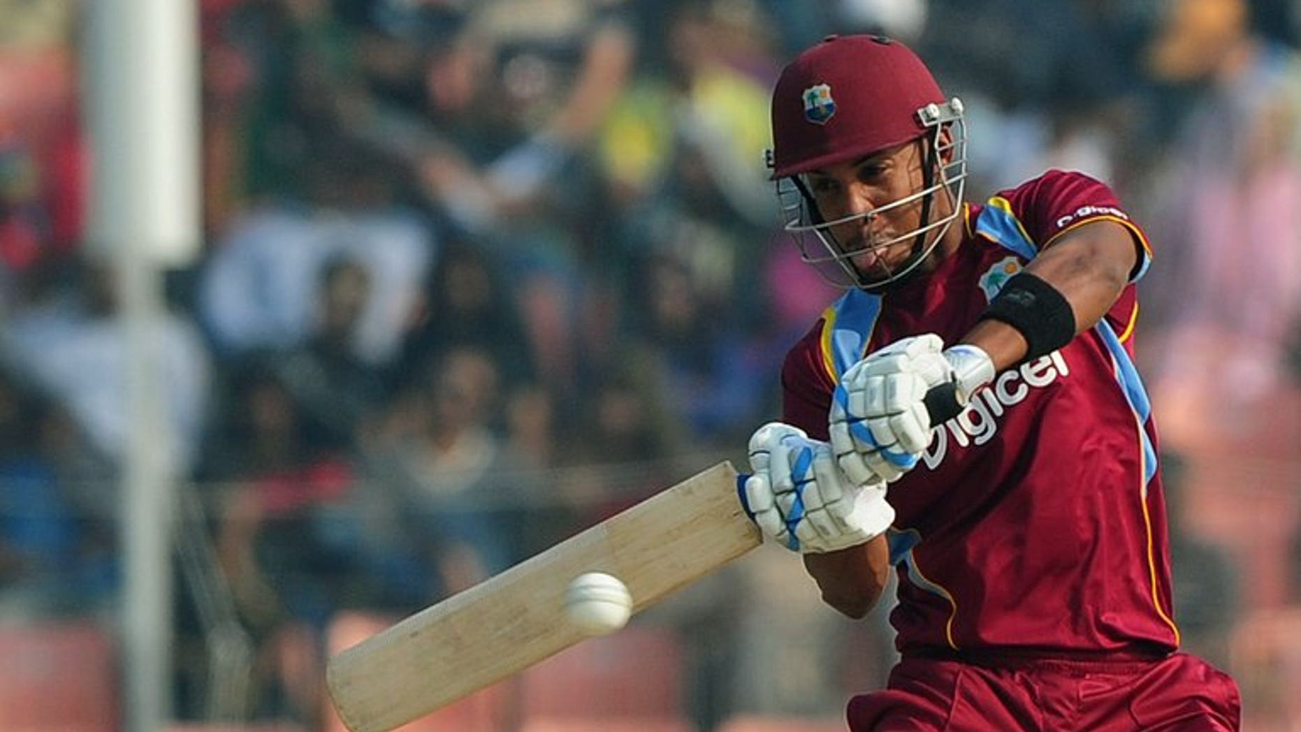 West Indies cricketer Lendl Simmons plays a shot in Khulna on November 30, 2012. Simmons has been summoned to replace suspended captain Dwayne Bravo in the West Indies squad to face Sri Lanka in the fifth match of the Tri-Nation Series at Queen's Park Oval on Sunday.