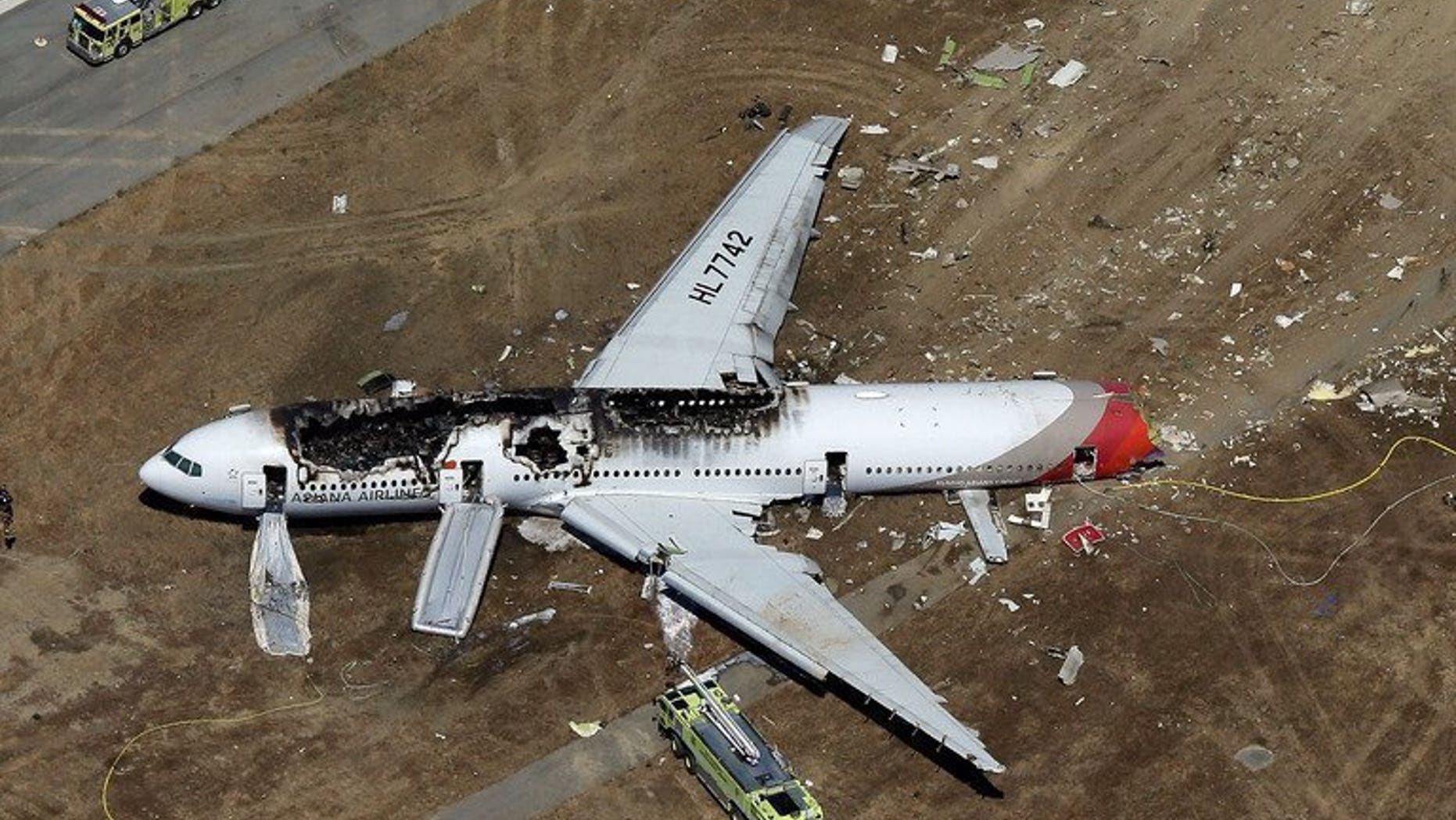 An Asiana Airlines Boeing 777 passenger jet after it crashed and burst into flames as it landed short of the runway at San Francisco International Airport. Chinese citizens are mourning two teenage girls killed in the incident.