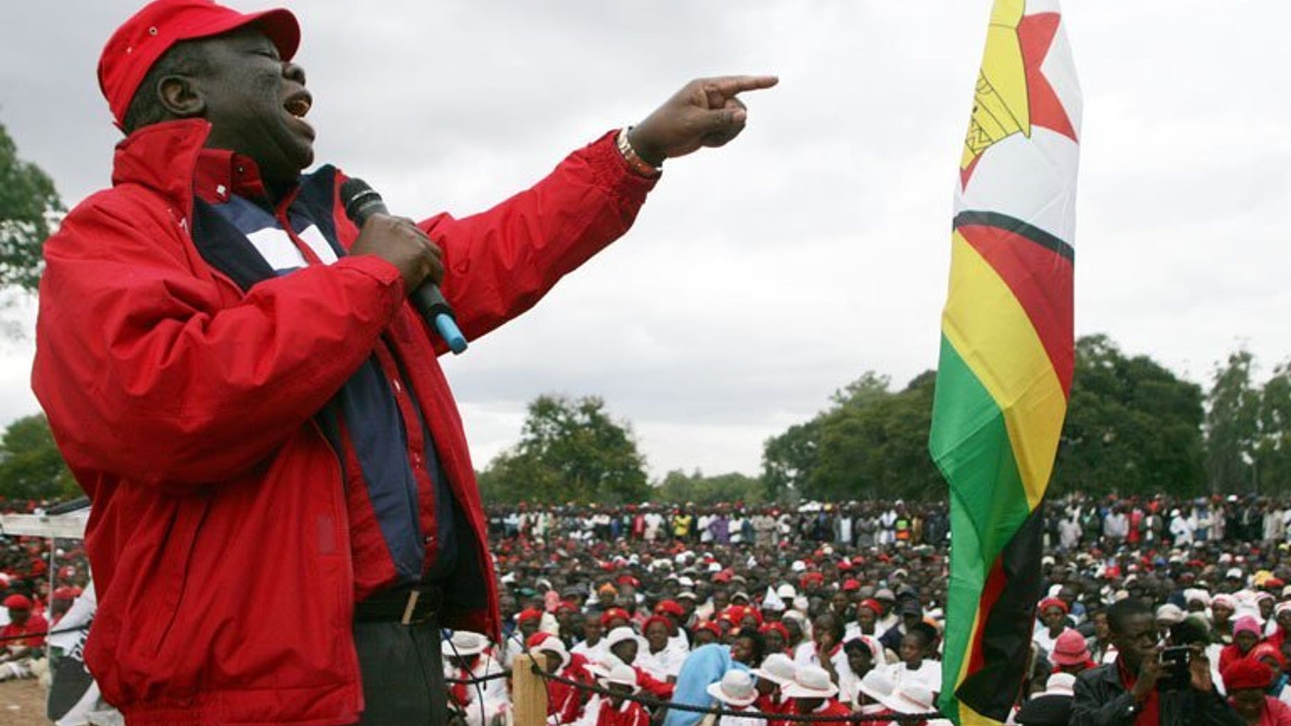 Morgan Tsvangirai speaks to party supporters at a party rally in Harare in May. There have been "no reforms" to guarantee that upcoming July 31 polls in Zimbabwe would be free and fair, the prime minister said on Sunday.