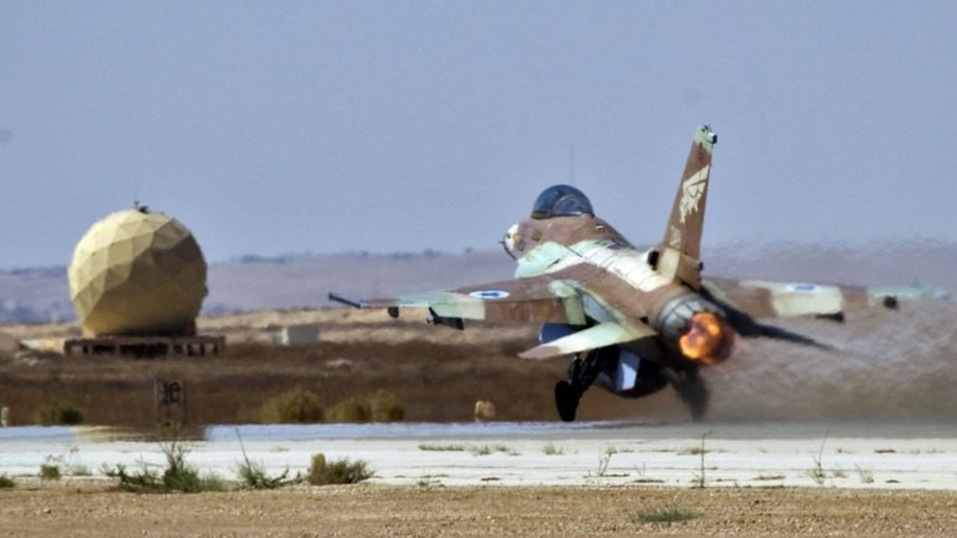 An Israeli F-16 fighter jet takes off at the Nevatim air force base near Beersheva on October 6, 2010. An Israeli warplane has crashed into the Mediterranean Sea following a malfunction although both crew members were rescued unharmed, a military spokesman tells AFP.