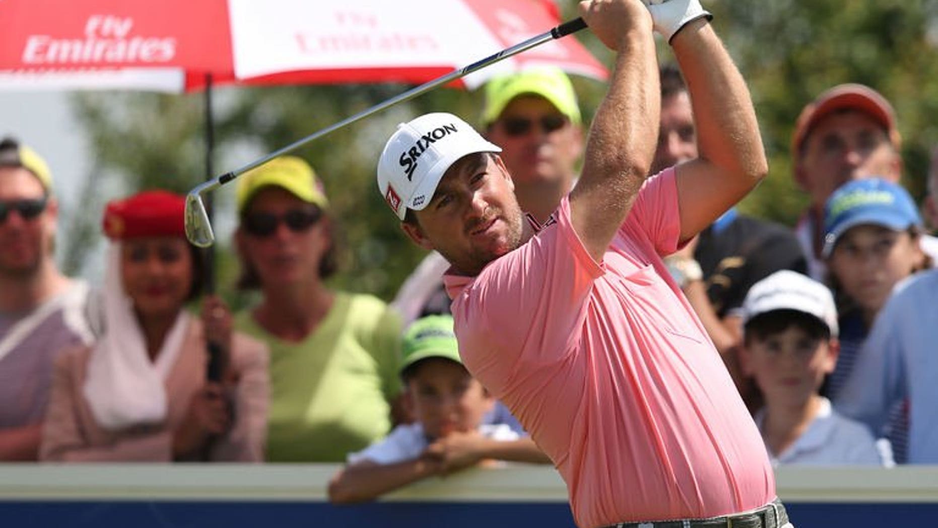 Graeme McDowell of Northern Ireland plays a shot during the final round of the French Open on July 7, 2013 at Le Golf National in Guyancourt, near Paris. McDowell produced a four-under-par final round of 67 to win the Open by four strokes on Sunday.