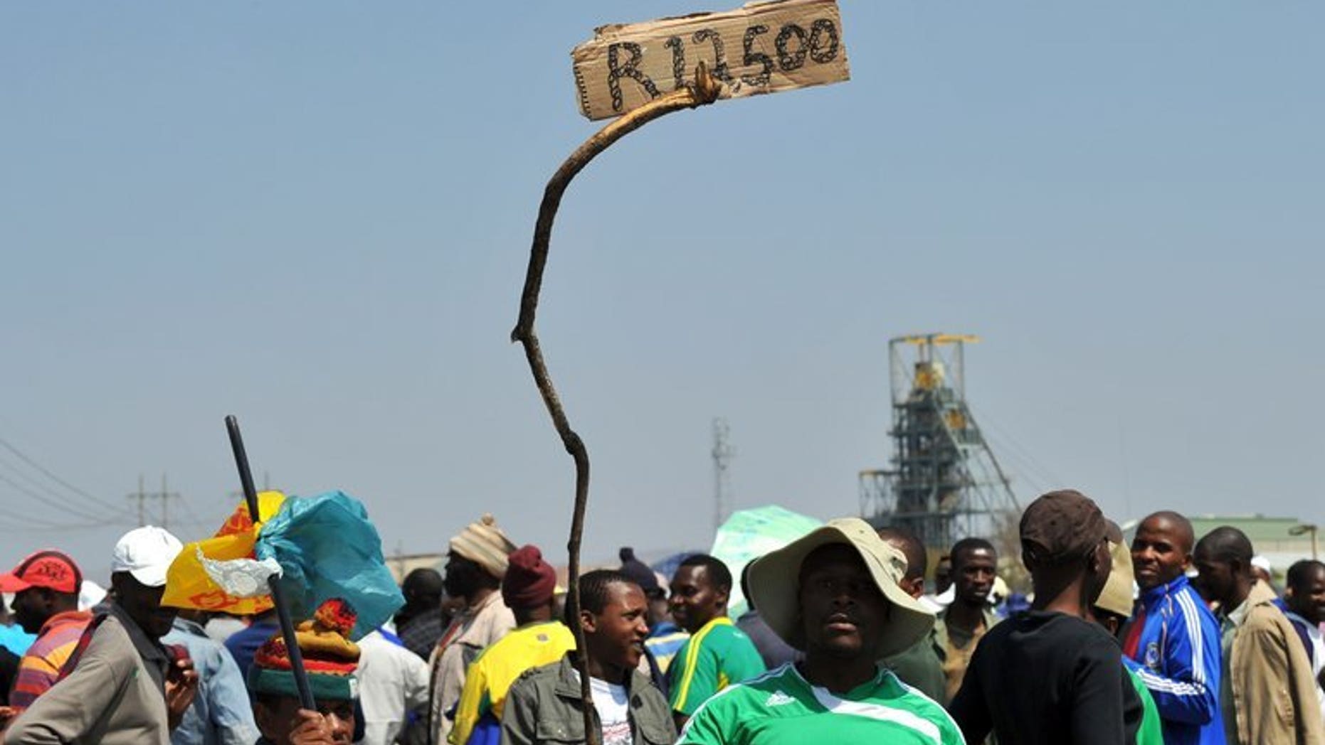 A sign in Rustenburg last September reads 12,500 rand, the wage sought by Amplats miners. Moody's rating agency on Monday warned South African banks and other lenders which issue loans without collateral face a bumpy time ahead as the economy wobbles and labour unrest continues.