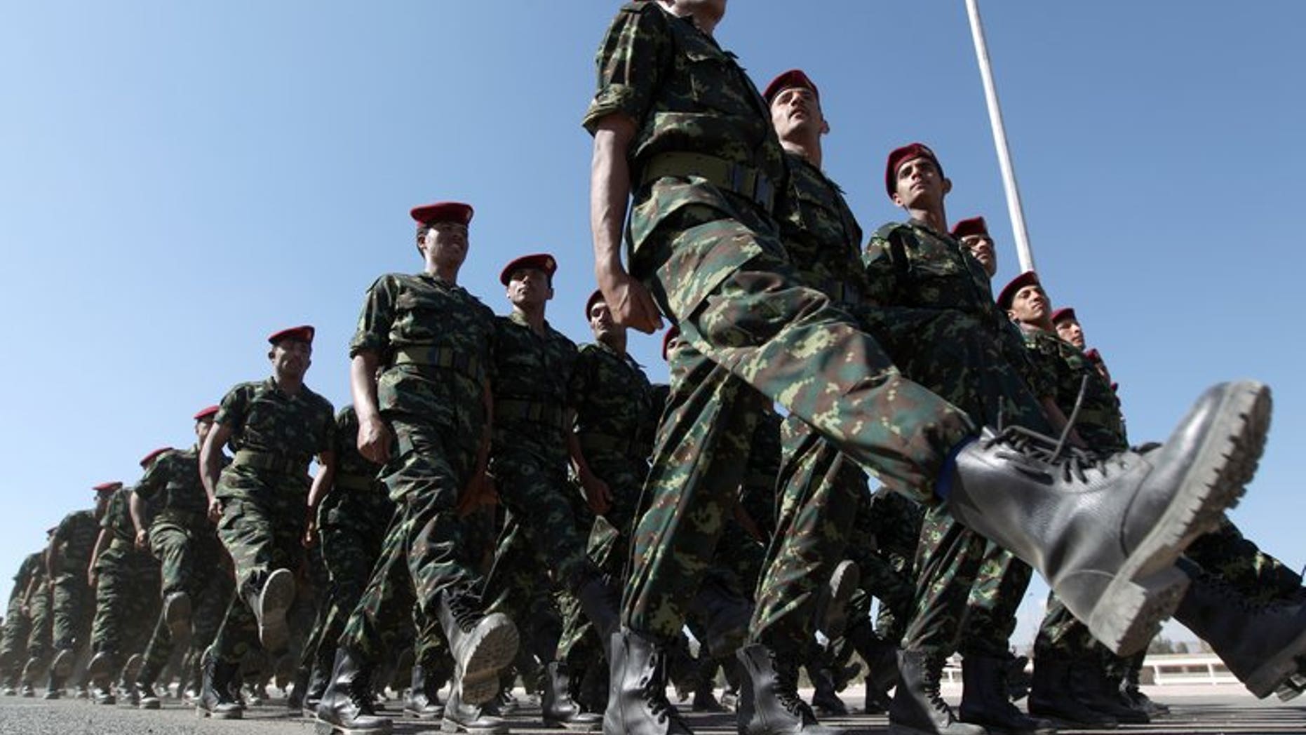 Soldiers of the Republican Guard march during the graduation ceremony for the first batch of a Personal Protection Battalion in the Yemeni capital Sanaa, on December 23, 2012. Gunmen shot dead a high-ranking Yemeni army officer Monday in the country's southeastern Hadramawt province as he was heading to work, a military official told AFP.