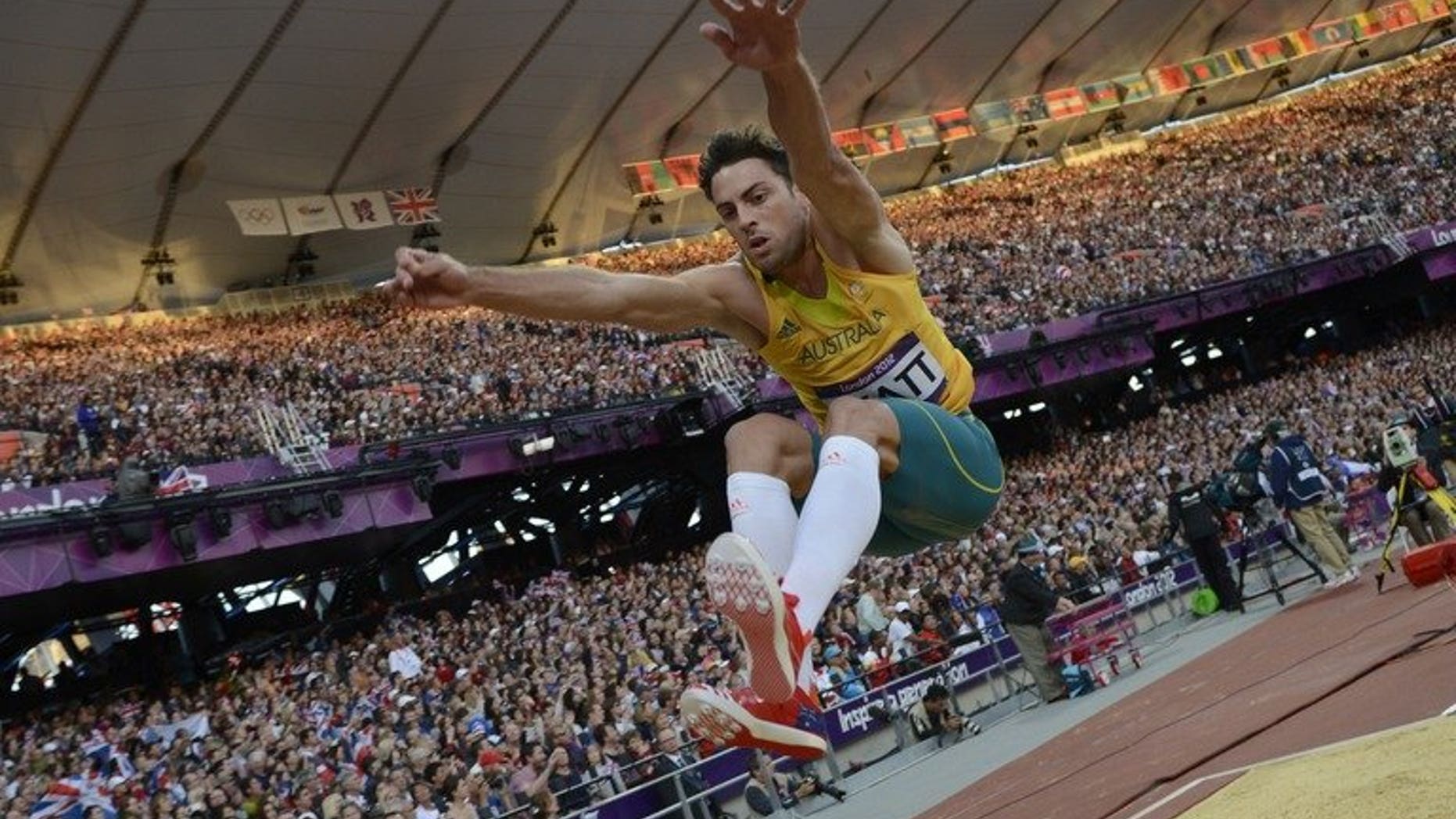 Australia's Mitchell Watt competes during the London Olympics men's long-jump qualifying rounds on August 3, 2012. He on Tuesday pulled out of the Moscow world championships after an injury-plagued build-up.